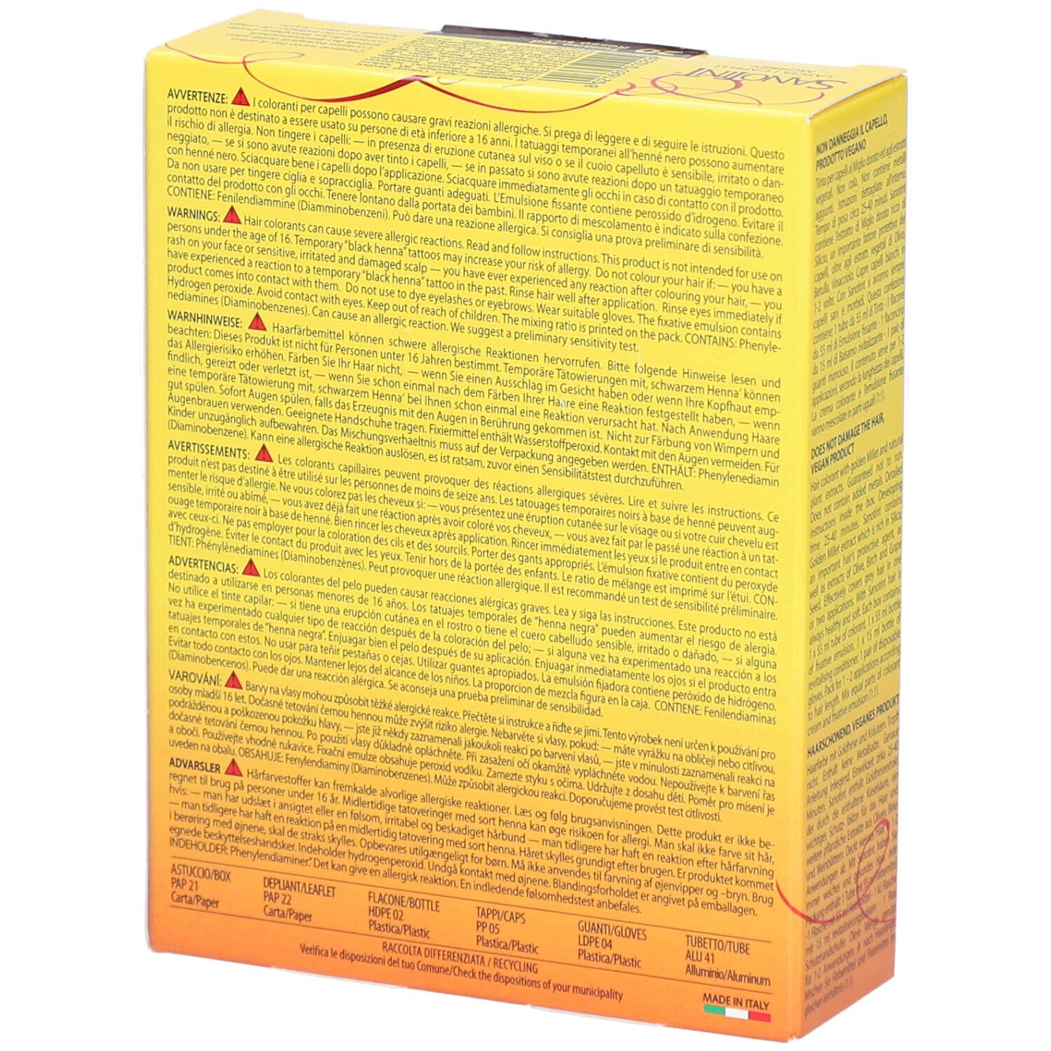 Boîte jaune, dos. Texte multilingue. Avertissements et ingrédients. Fabriqué en Italie.