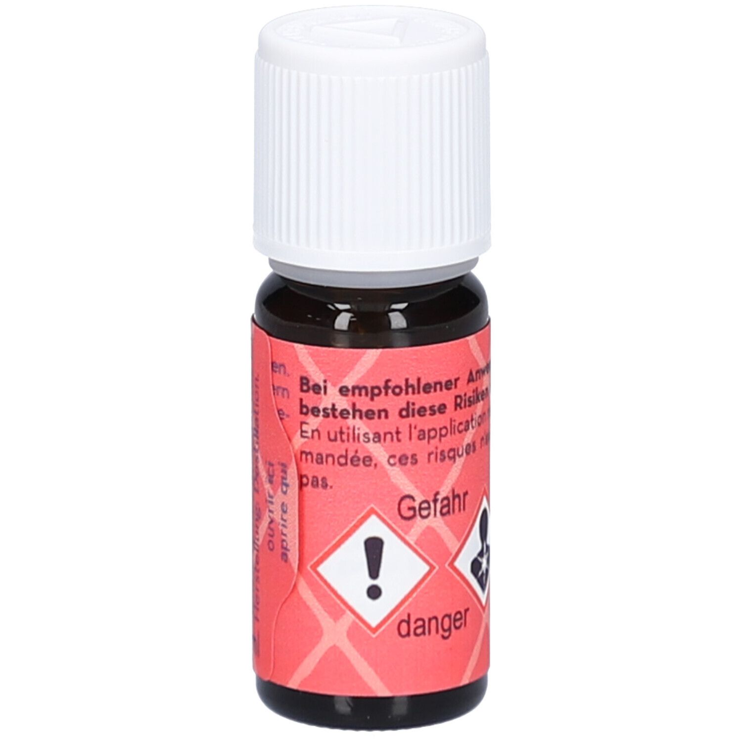 Braune Glasflasche mit weißem Schraubverschluss. Rotes Etikett mit Gefahrensymbolen und Text: Gefahr, Lavendel Mt. Blanc.