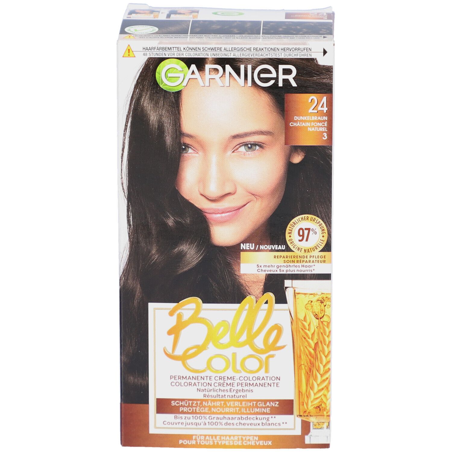 Face avant de la boîte Belle Color. Garnier, Belle Color, numéro de couleur 24. Femme aux cheveux bruns. Inscriptions : Nouveau, 97% Soin réparateur.