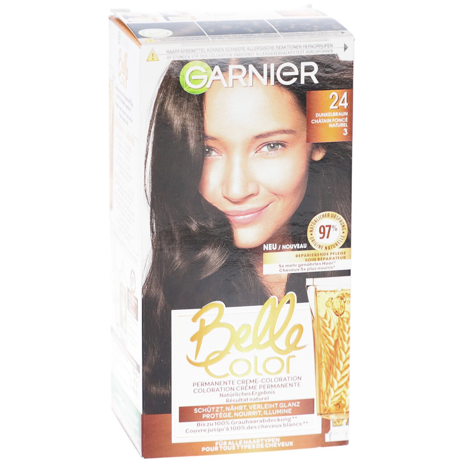 Face avant de la boîte Belle Color. Garnier, Belle Color, numéro de couleur 24. Femme aux cheveux bruns. Inscriptions : Nouveau, 97% Soin réparateur.