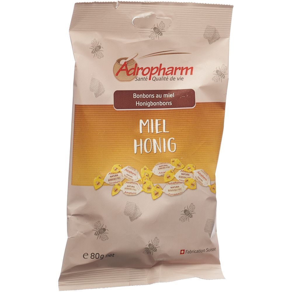 Sachet de bonbons au miel Adropharm. Inscription: Miel Honig, Bonbons au miel. Fabrication suisse. Contenu: 80g.