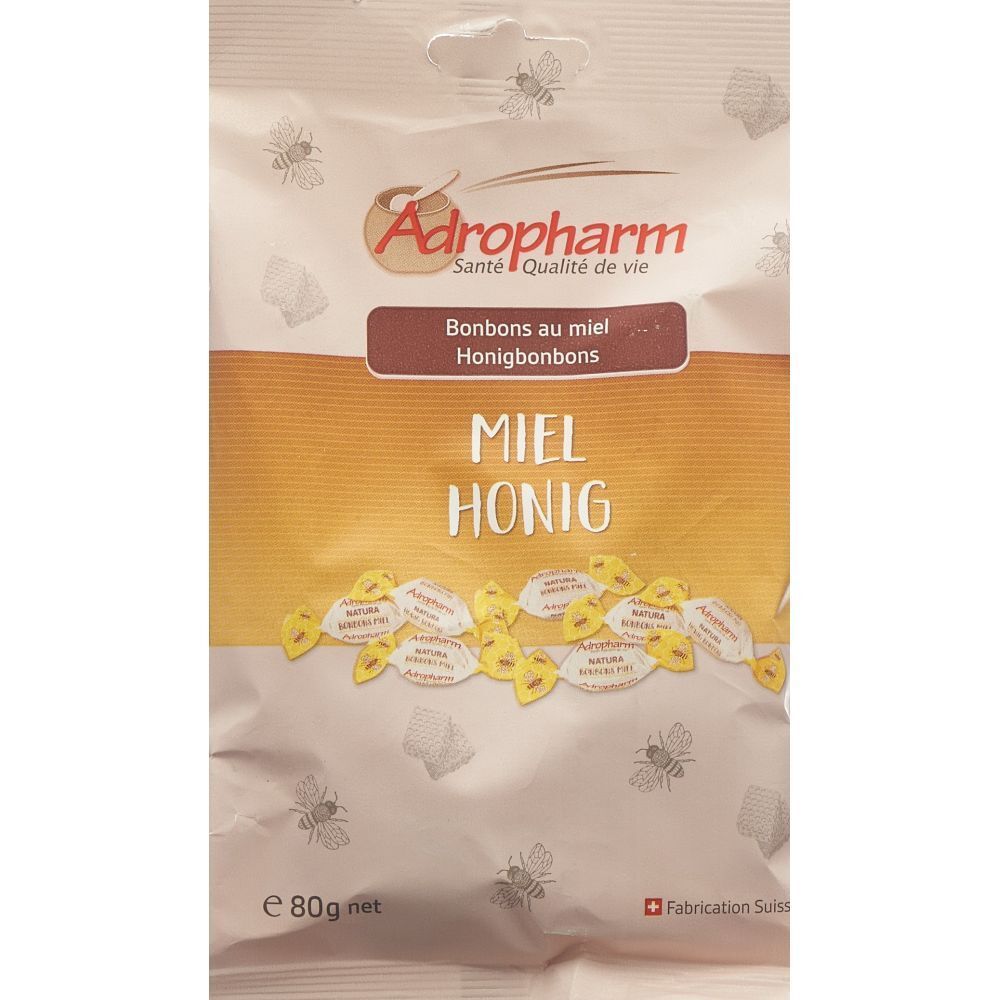 Sachet de bonbons au miel Adropharm. Inscription: Miel Honig, Bonbons au miel. Fabrication suisse. Contenu: 80g.