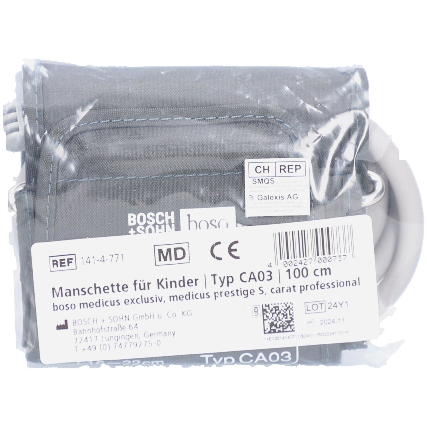 Brassard dans un emballage plastique. Avec étiquette: nom du produit, réf., marquage CE. Texte en allemand. Code-barres.