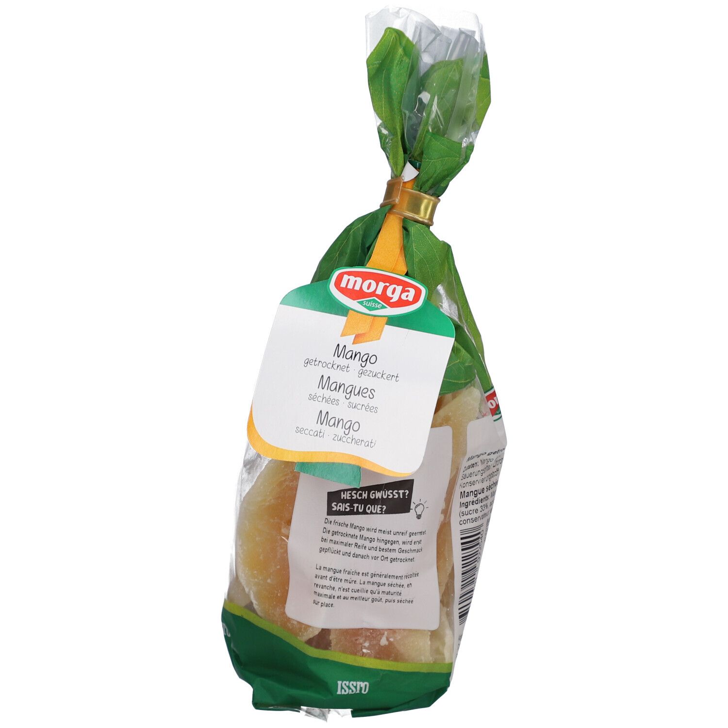 Verpackung mit getrockneten Mango-Schnitzen. Klarsichtbeutel mit grünem Papier und goldfarbenem Verschluss. Morga-Logo.