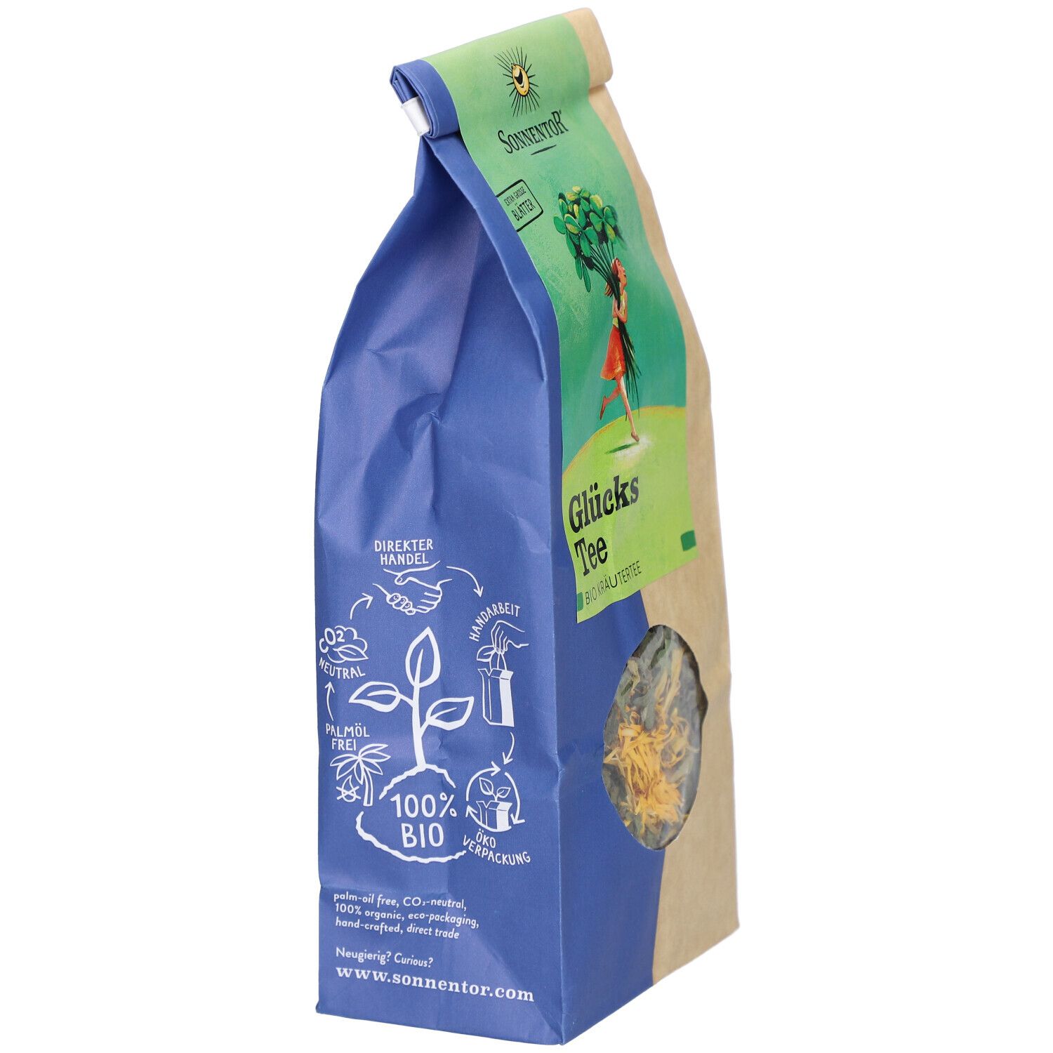 Blauer Beutel mit Glücks Tee, BIO Kräutertee. Sichtfenster. Aufdrucke: 100% BIO, direkter Handel. Marke: SONNENTOR.
