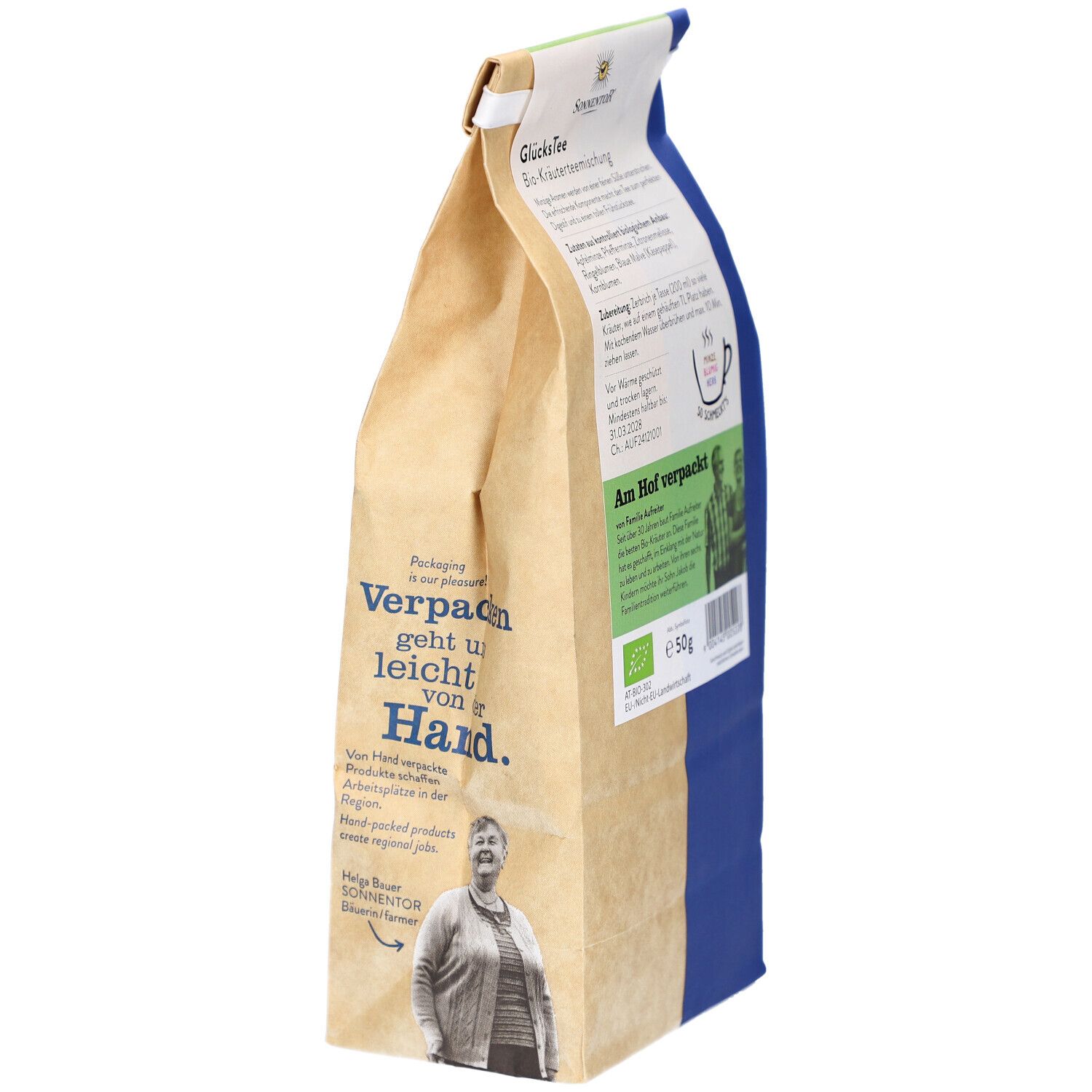 Beutel mit Glücks Tee, BIO Kräutertee. Text über Verpackung. BIO-Siegel. Marke: SONNENTOR. 50g.