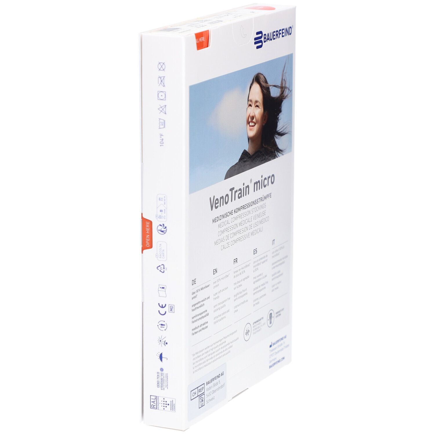 Boîte de bas de compression Bauerfeind VenoTrain micro. Arrière avec informations multilingues. Vue latérale. Femme souriante.