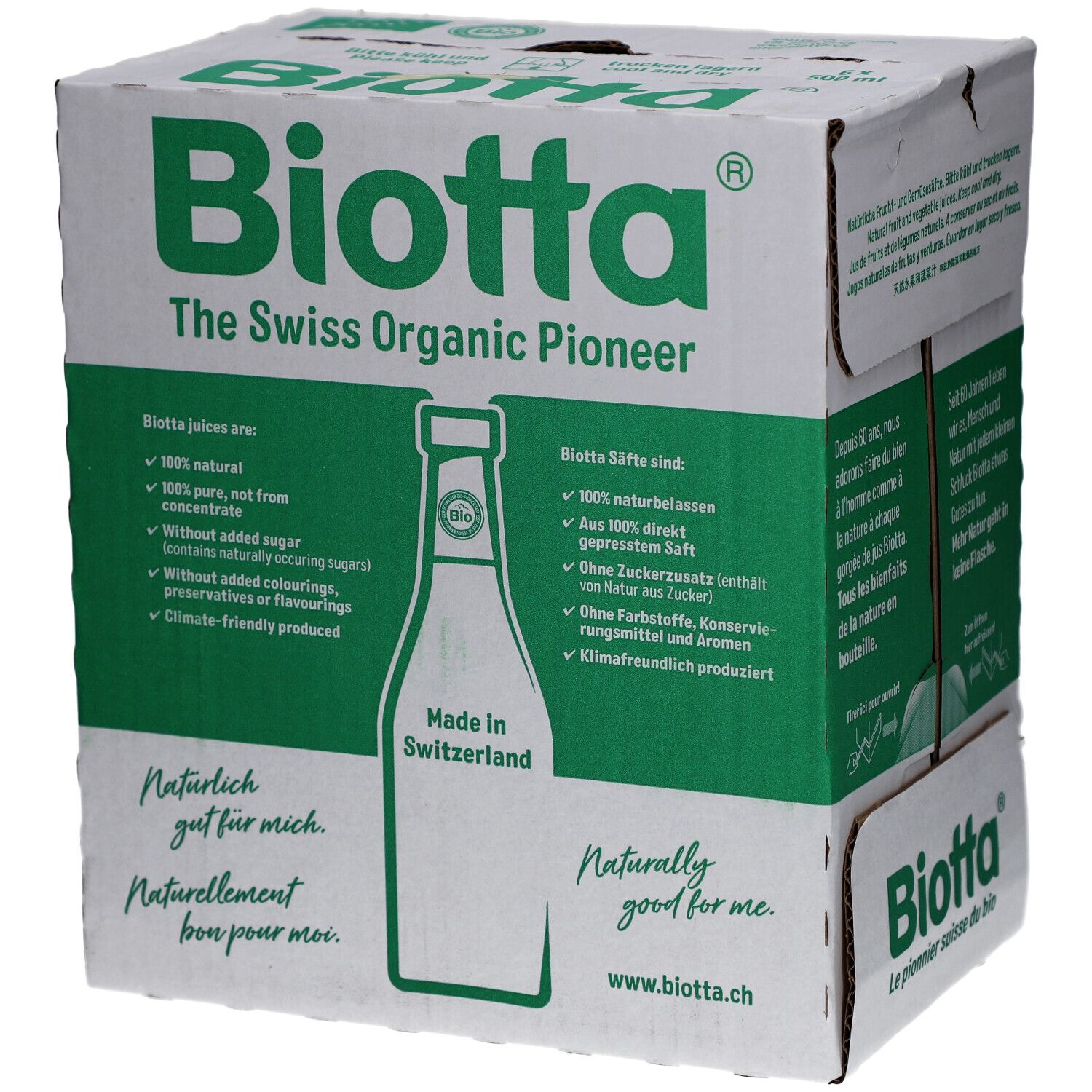 Carton BIOTTA. Emballage vert et blanc. Texte: Le pionnier suisse du bio. Naturellement bon pour moi. www.biotta.ch.