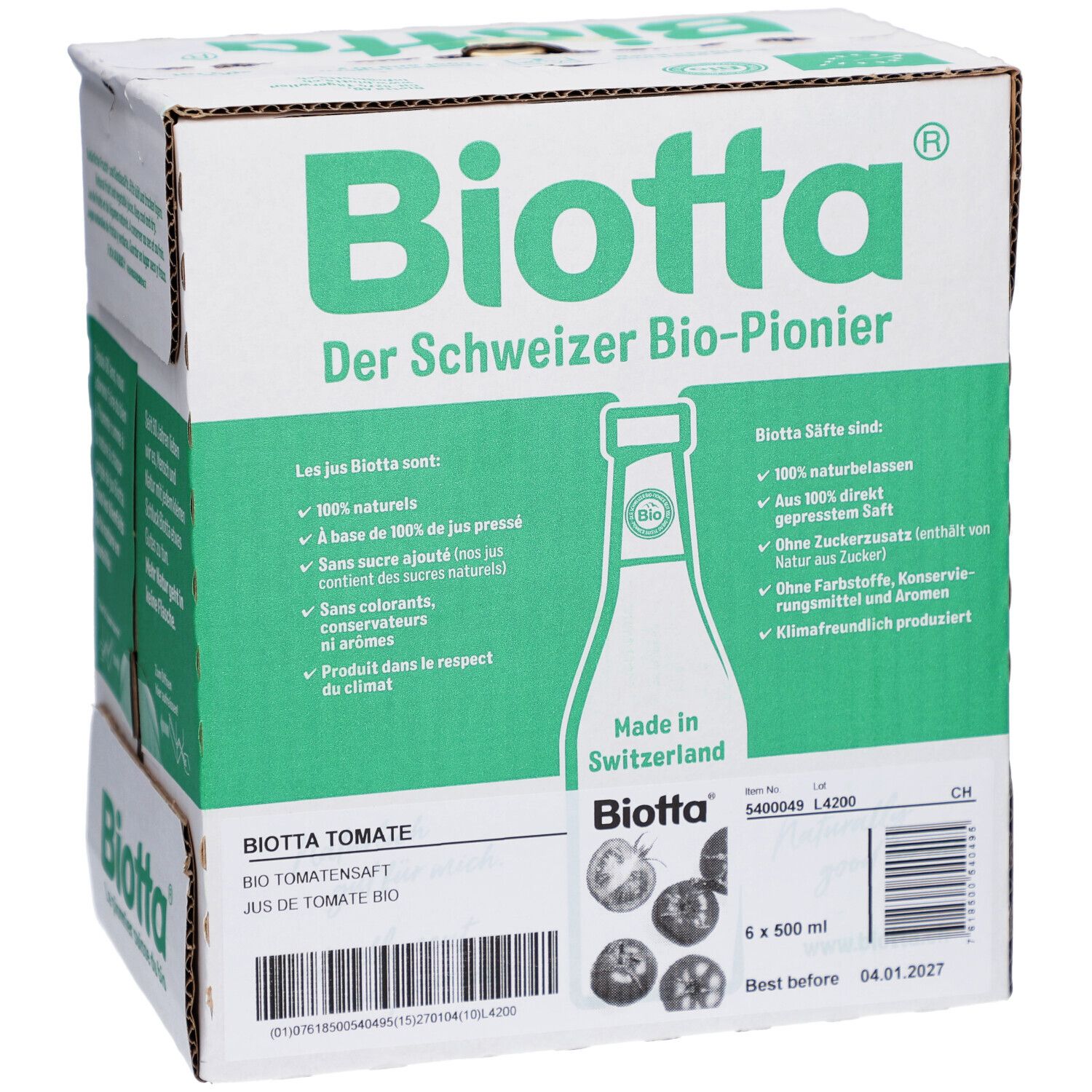 Carton BIOTTA Tomate Bio. Six bouteilles, 500 ml. Emballage vert et blanc. Texte: Le pionnier suisse du bio. Fabriqué en Suisse.