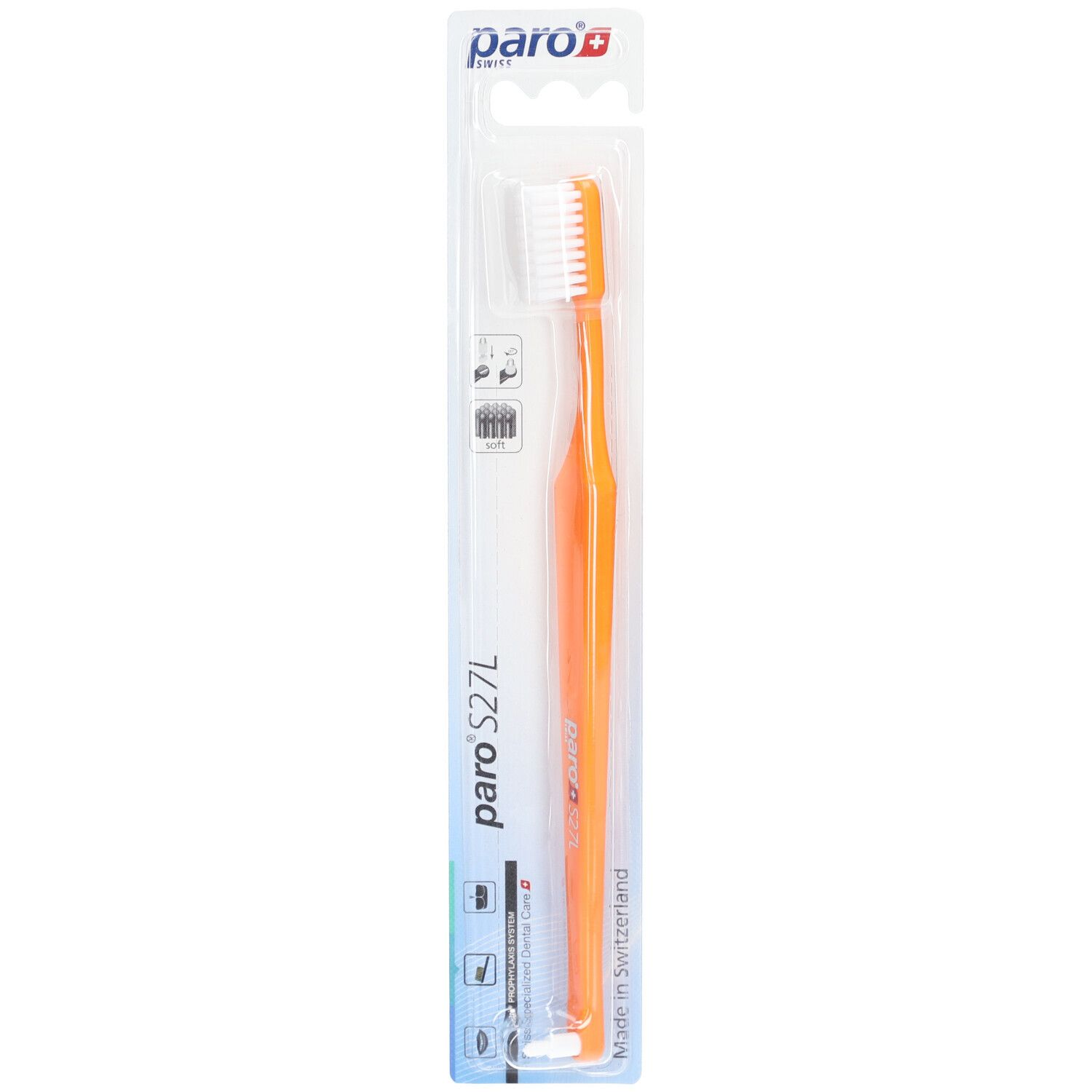 Zahnbürste in Blisterverpackung. Orangefarbener Griff, weißer Bürstenkopf. Marke: paro.
