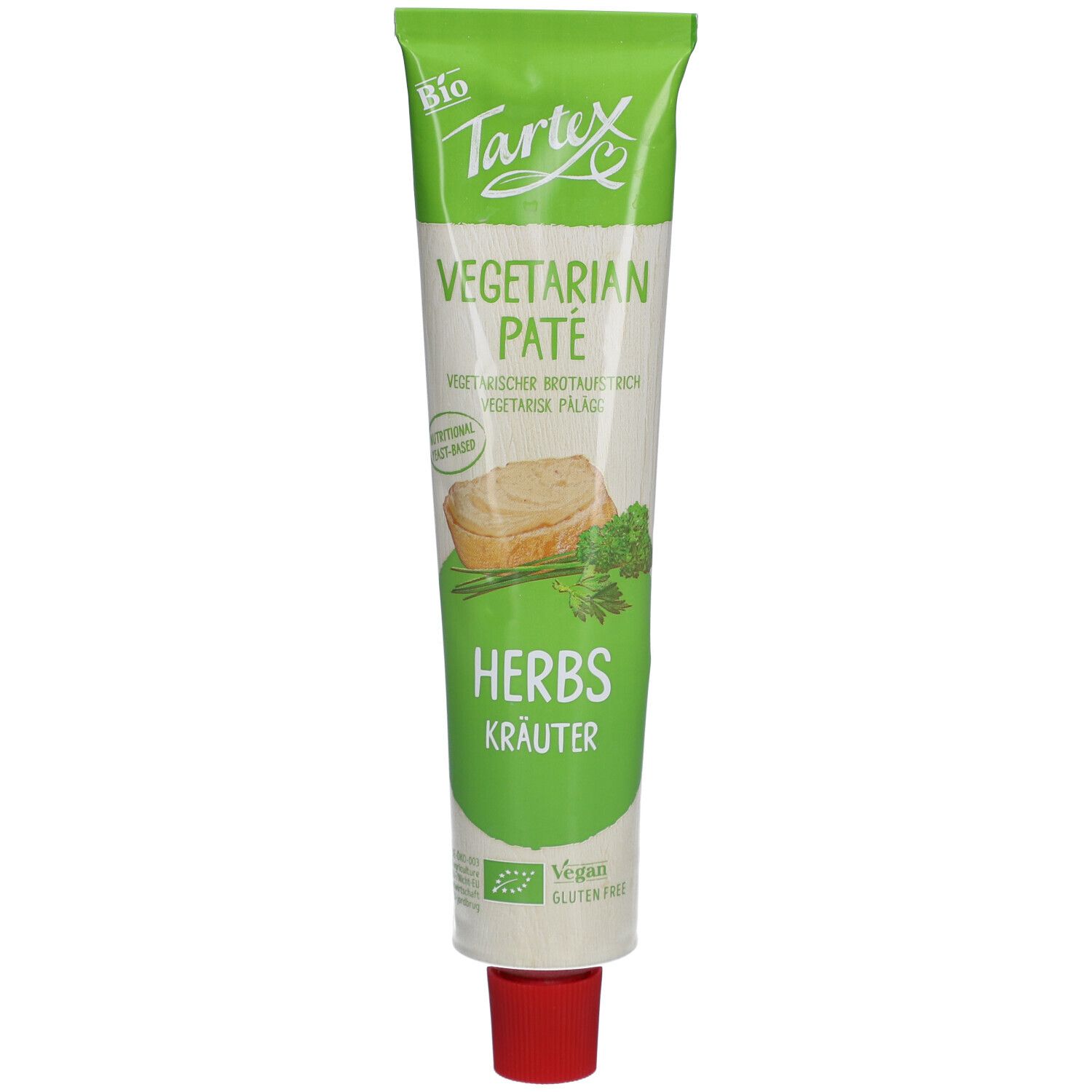 Tube vert avec inscription Tartex, pâté végétarien aux herbes. Label bio, végétalien et sans gluten.
