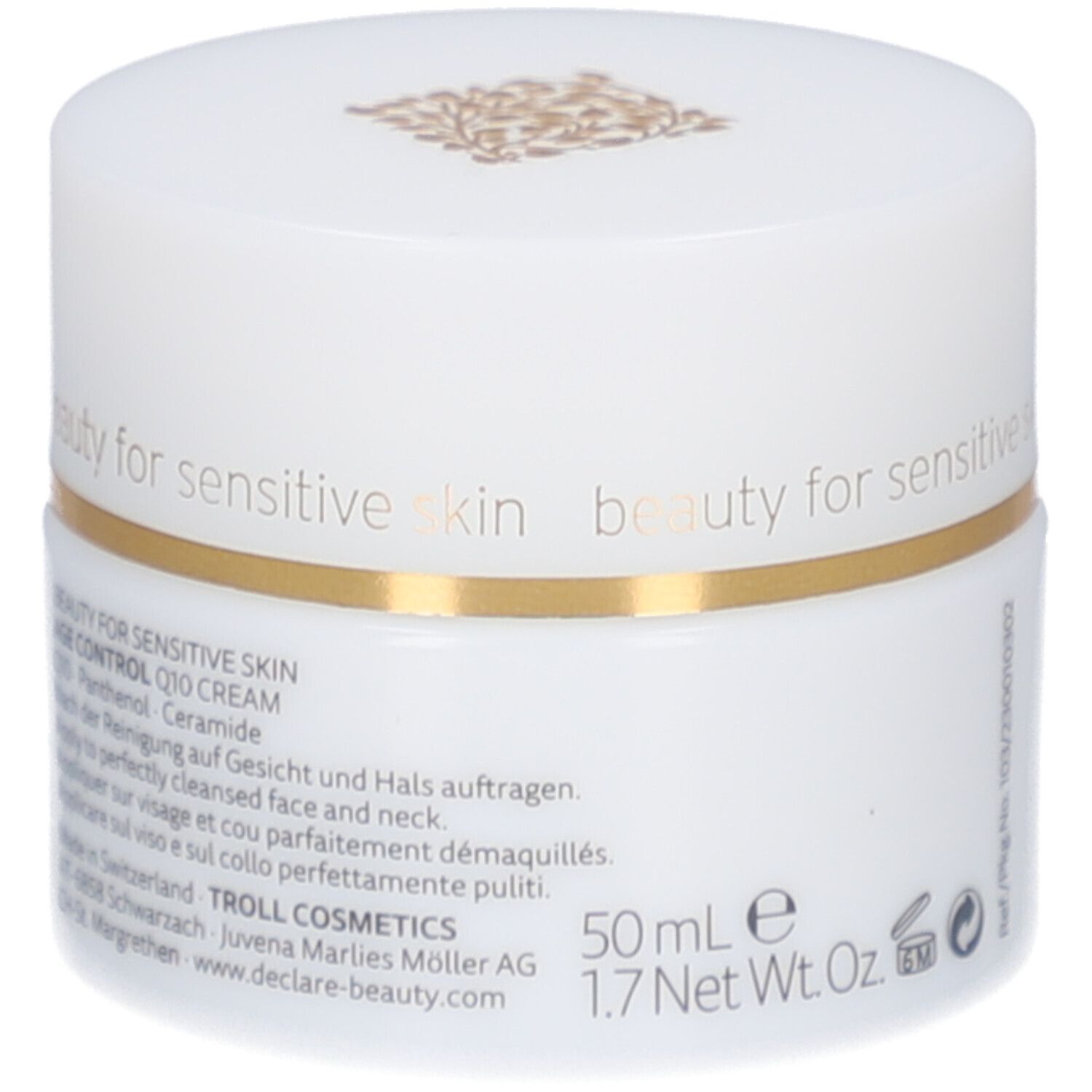 Pot blanc, bord doré. DECLARÉ, Q10 Crème. Inscription: beauty for sensitive skin.