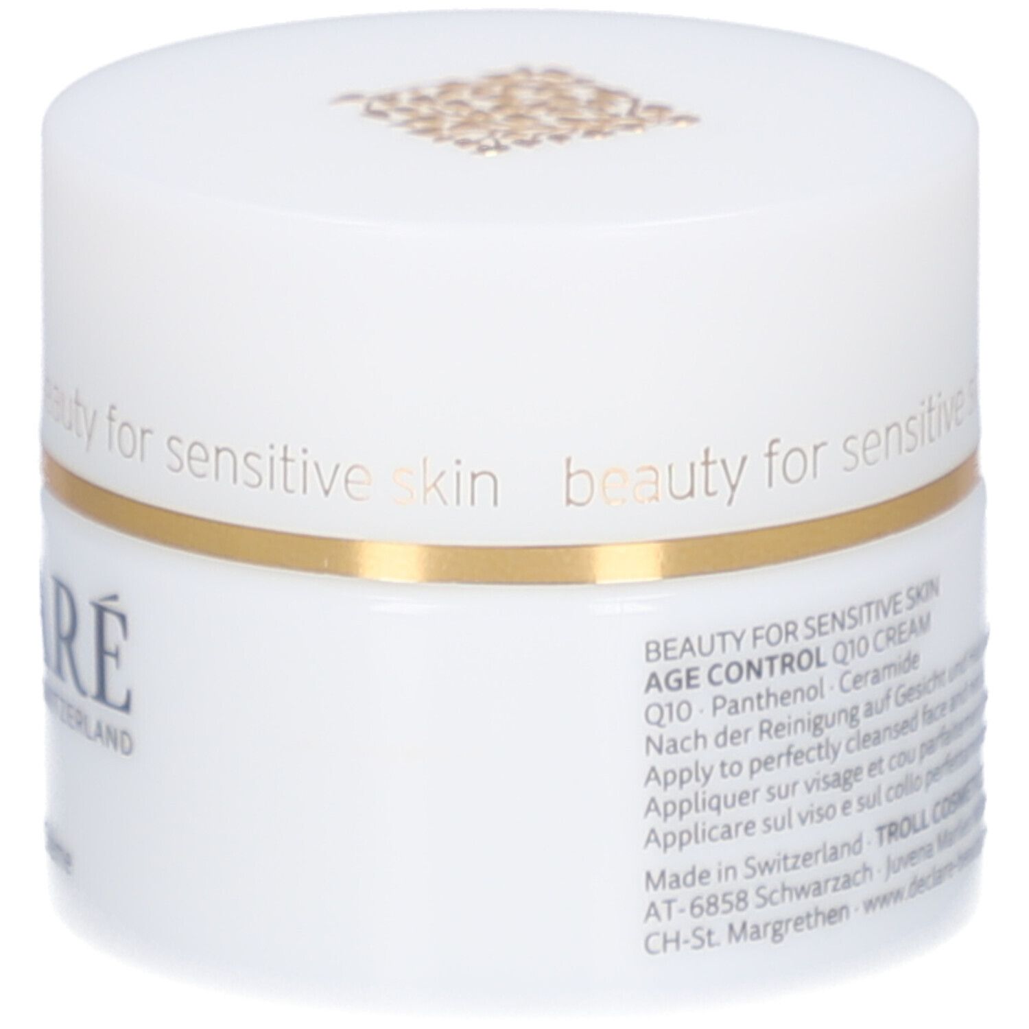 Pot blanc, bord doré. DECLARÉ, Q10 Crème. Inscription: beauty for sensitive skin.