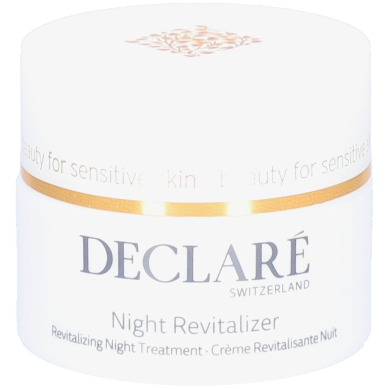 Weißes Tiegel mit goldfarbenem Rand. Aufschrift: DECLARÉ, Night Revitalizer. Text: Revitalizing Night Treatment.