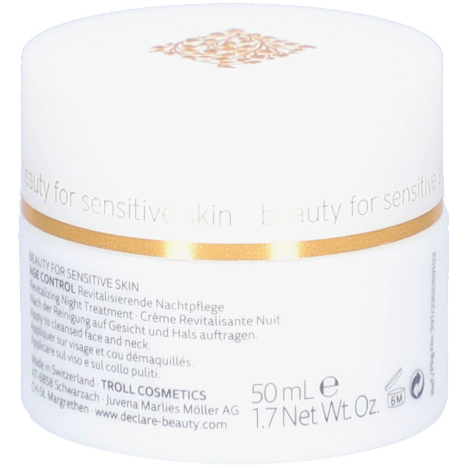 Weißes Tiegel mit goldfarbenem Rand. Aufschrift: DECLARÉ, Night Revitalizer. Text: Revitalizing Night Treatment.