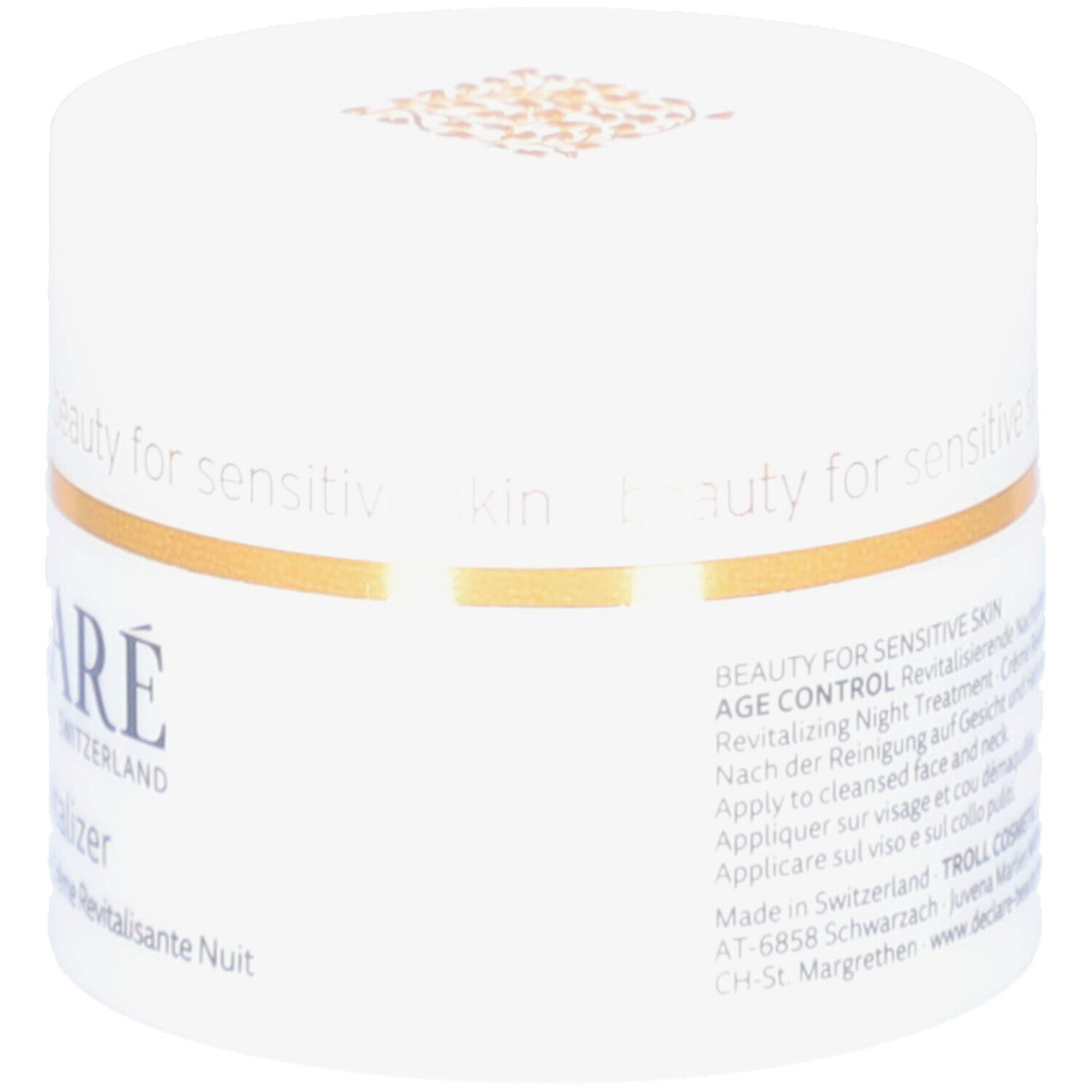 Weißes Tiegel mit goldfarbenem Rand. Aufschrift: DECLARÉ, Night Revitalizer. Text: Revitalizing Night Treatment.