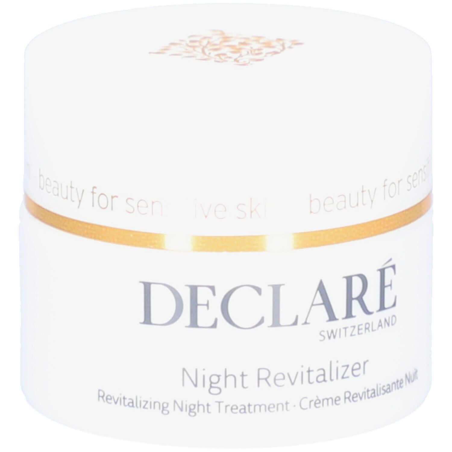 Weißes Tiegel mit goldfarbenem Rand. Aufschrift: DECLARÉ, Night Revitalizer. Text: Revitalizing Night Treatment.