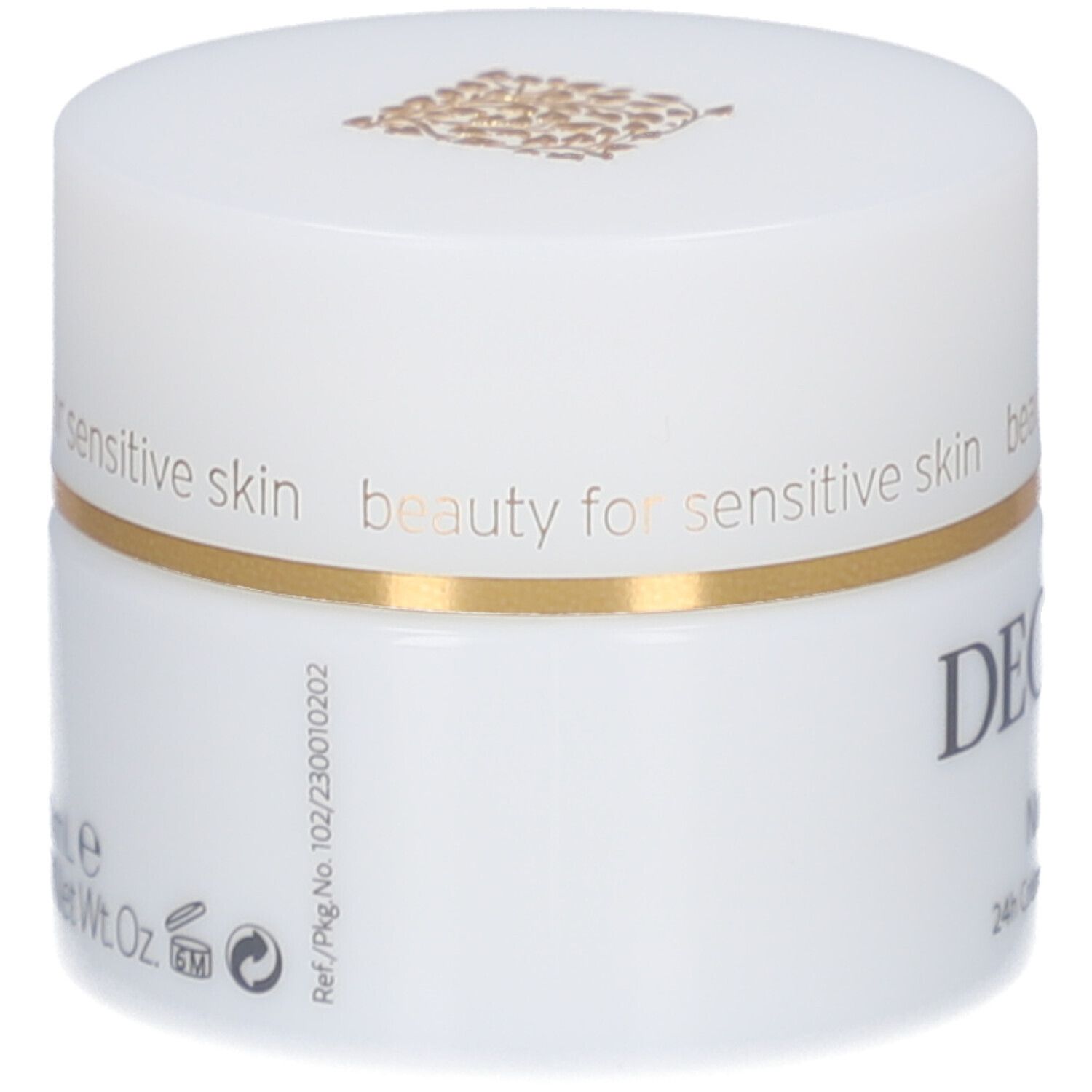 Pot blanc avec couvercle. Anneau doré. Logo DECLARÉ. Texte : beauty for sensitive skin. Inscription sur le côté.