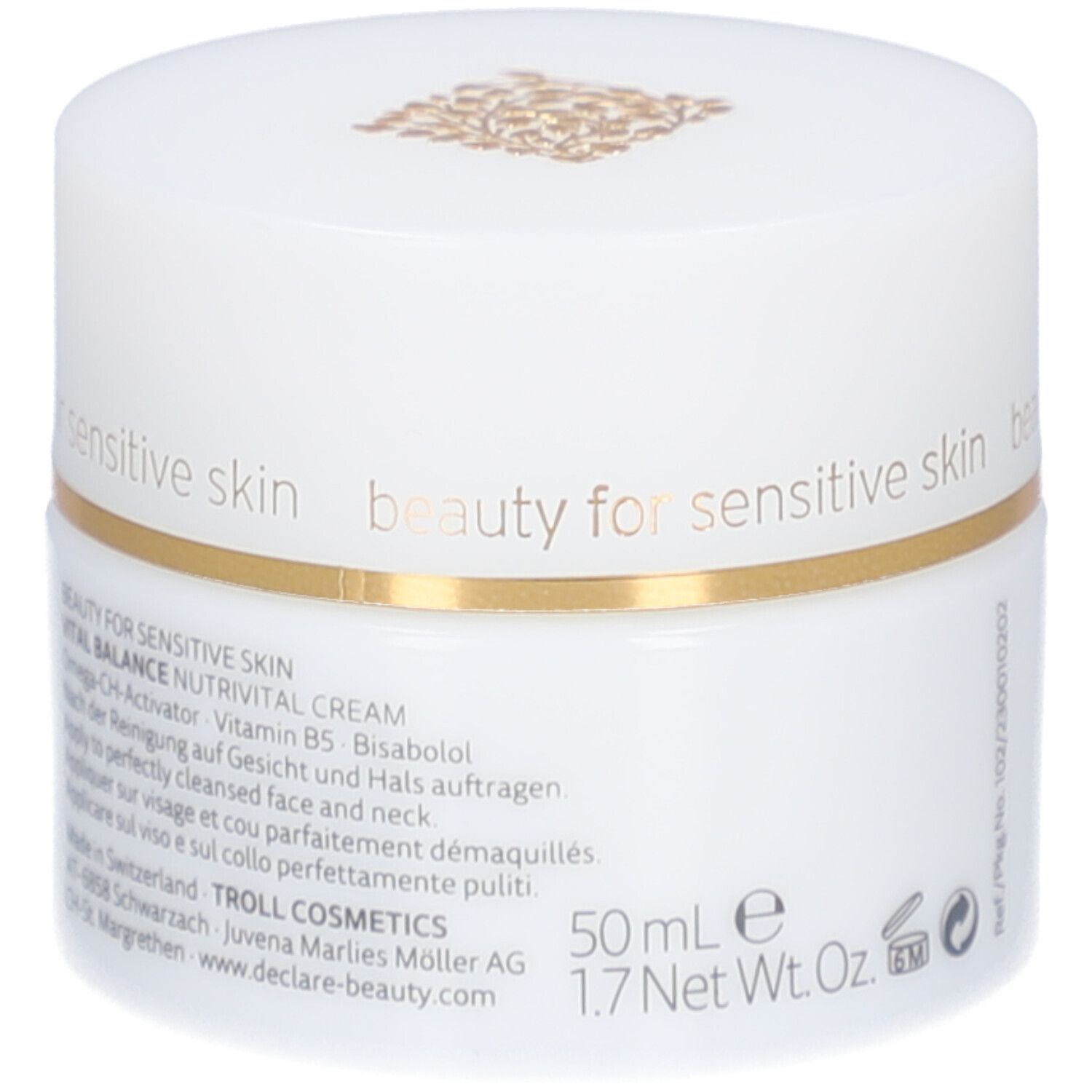 Pot blanc avec couvercle. Anneau doré. Logo DECLARÉ. Texte : beauty for sensitive skin. Informations produit sur le côté.