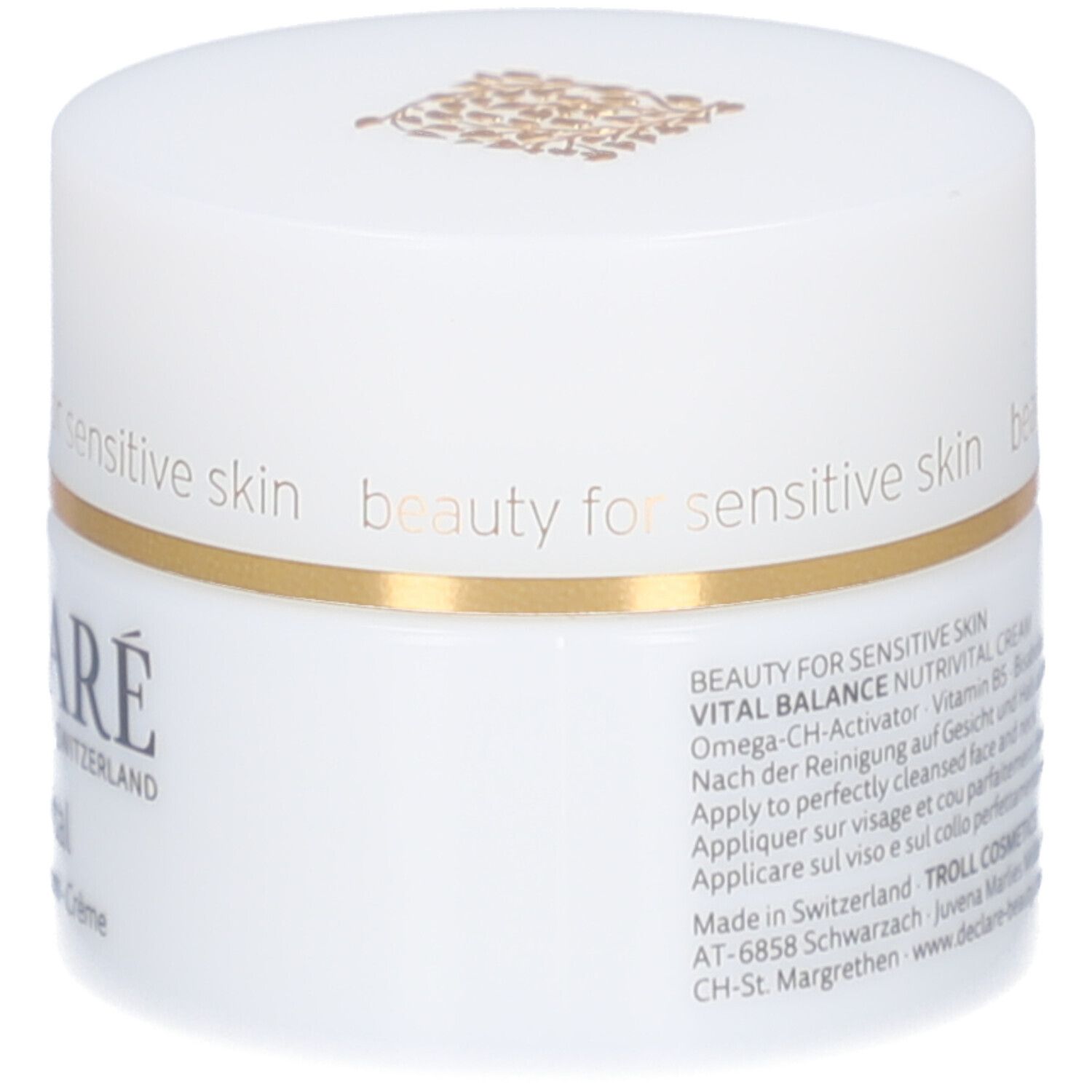 Pot blanc avec couvercle. Anneau doré. Logo DECLARÉ. Texte : beauty for sensitive skin. Informations produit sur le côté.