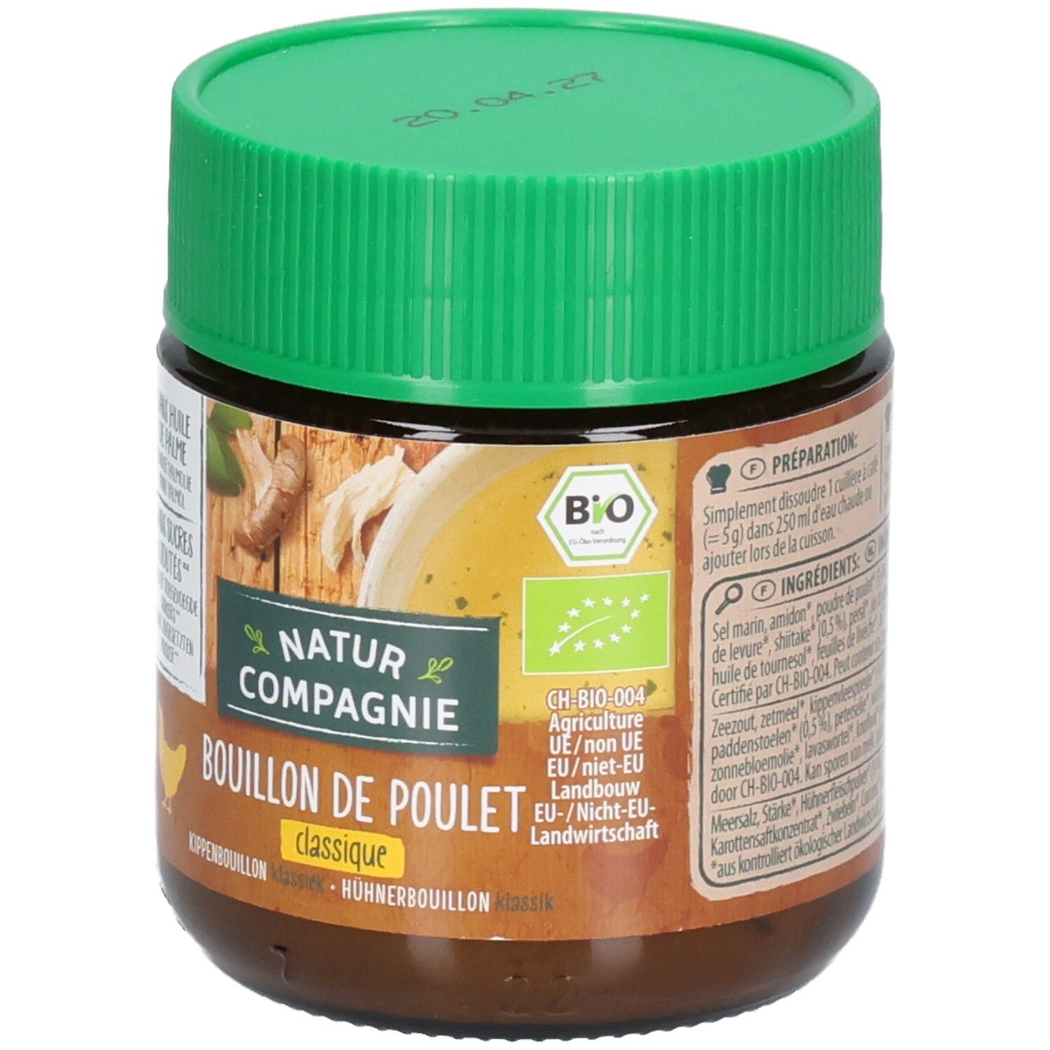 Braune Glasdose mit grünem Deckel. Aufschrift: NATUR COMPAGNIE, BOUILLON DE POULET classique. Bio-Siegel. Abbildung: Hühner und Gemüse.
