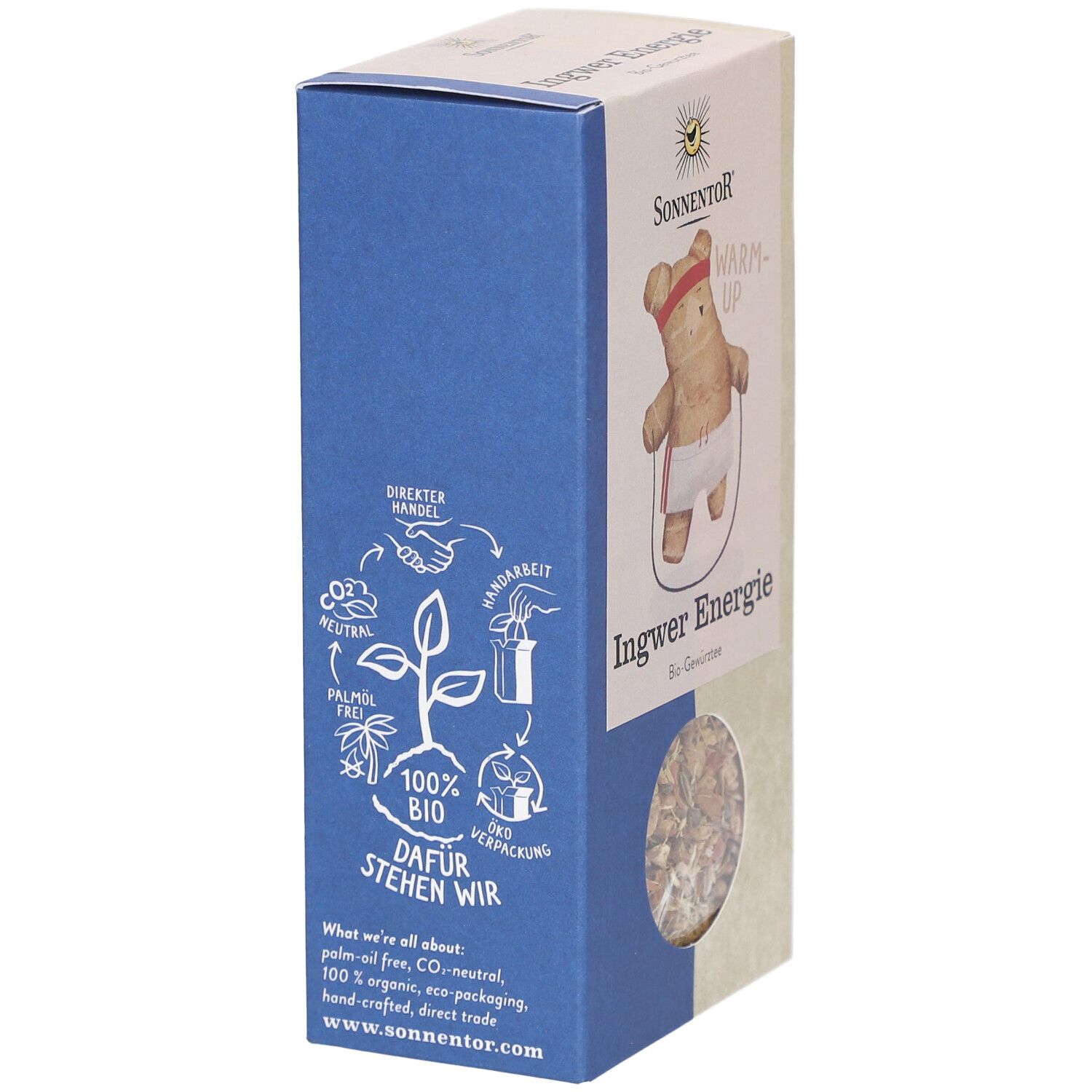Boîte de thé SONNENTOR Ingwer Energie BIO. Côté bleu avec illustrations et texte. Fenêtre avec thé visible.