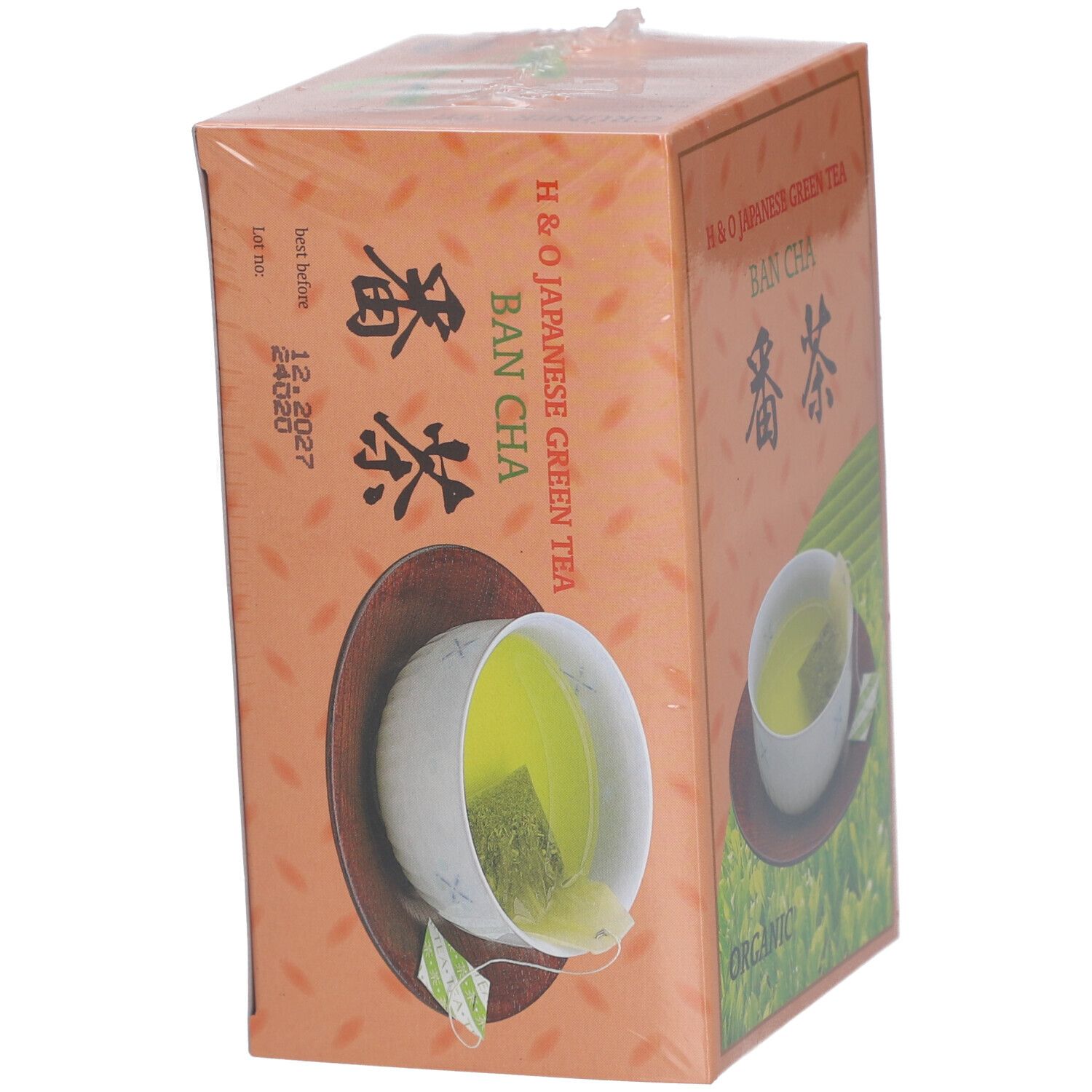 Boîte de thé vert japonais H&O Bancha. Image d'une tasse de thé, texte et logo. Inscription "Organic". Date de péremption.