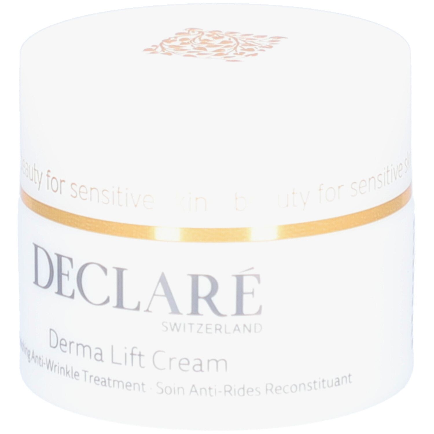 Pot blanc avec anneau doré. Inscription : DECLARÉ SWITZERLAND, Derma Lift Cream. Texte : Replenishing Anti-Wrinkle Treatment.