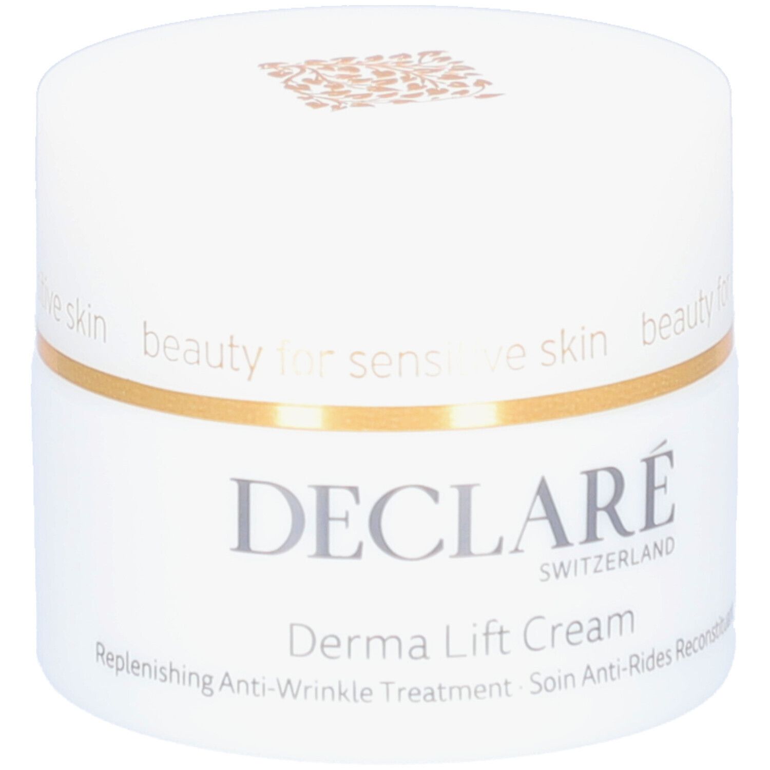 Pot blanc avec anneau doré. Inscription : DECLARÉ SWITZERLAND, Derma Lift Cream. Texte : Replenishing Anti-Wrinkle Treatment.