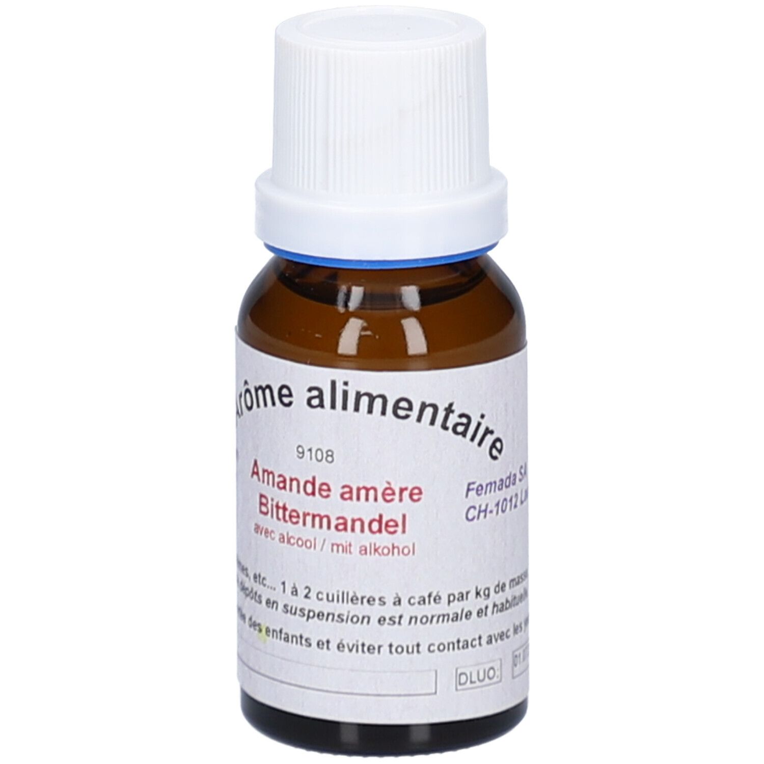 Braune Glasflasche mit weißem Deckel. Etikett mit Text: Aromen, Bittermandel, mit Alkohol. Blaue Ring am Flaschenhals. Herstelleradresse.