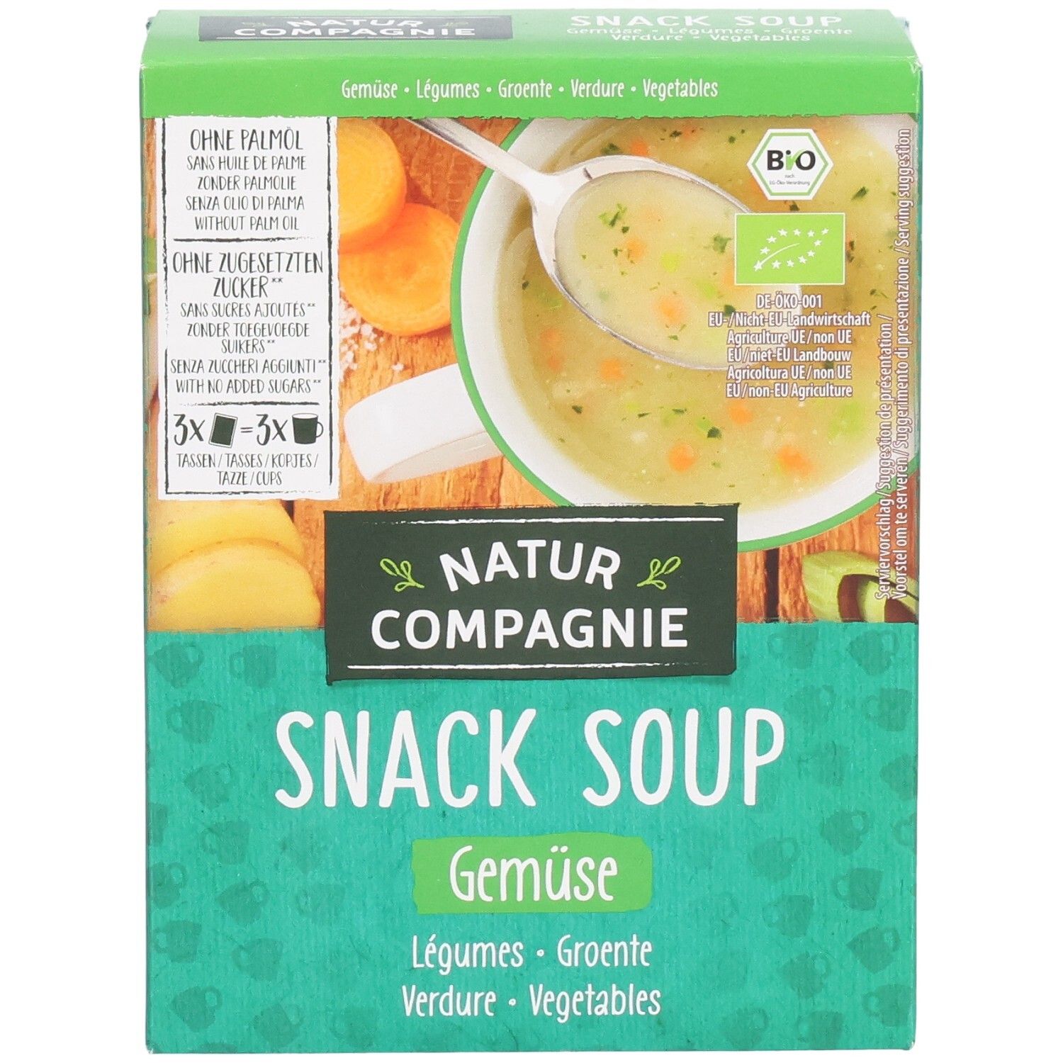Grüne Schachtel mit "Natur Compagnie Snack Soup Gemüse". Abbildung von Suppe in Schüssel. Bio-Siegel.