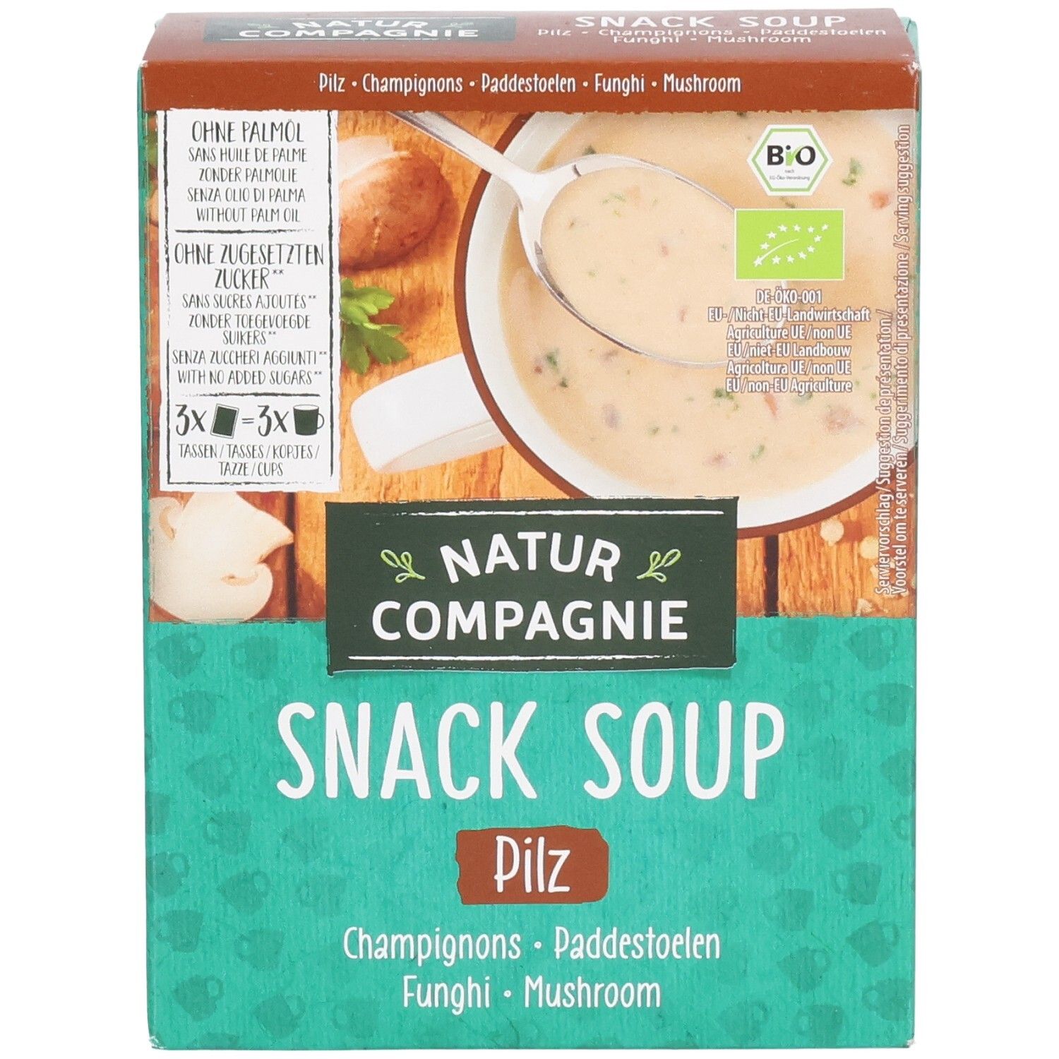Verpackung von Snack Soup. Grüne Schachtel mit Logo und Produktbild. Text: Snack Soup Pilz, Bio-Siegel, ohne Palmöl, ohne Zucker.