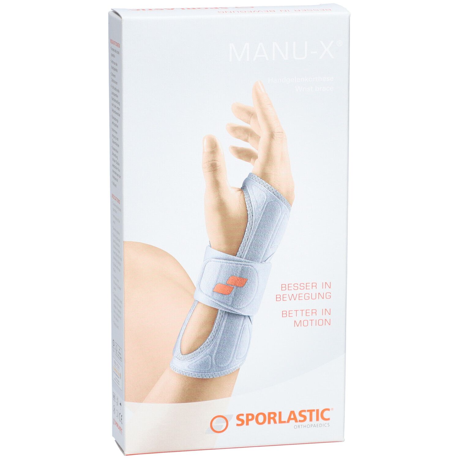 Emballage de l'orthèse de poignet MANU-X. Montre une main portant l'orthèse. Logo SPORLASTIC en bas. Texte : BESSER IN BEWEGUNG / BETTER IN MOTION.