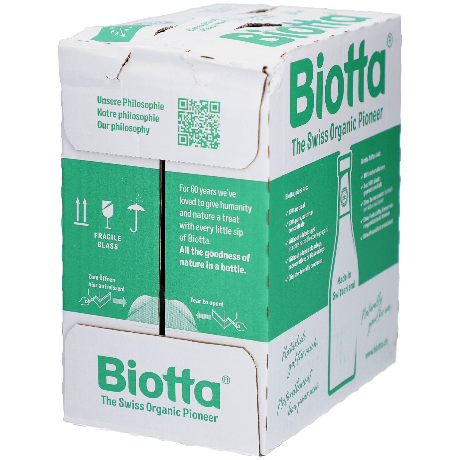 Karton mit BIOTTA Waldheidelbeere Bio. Grüne und weiße Verpackung. Text: The Swiss Organic Pioneer. Hinweise zum Öffnen.