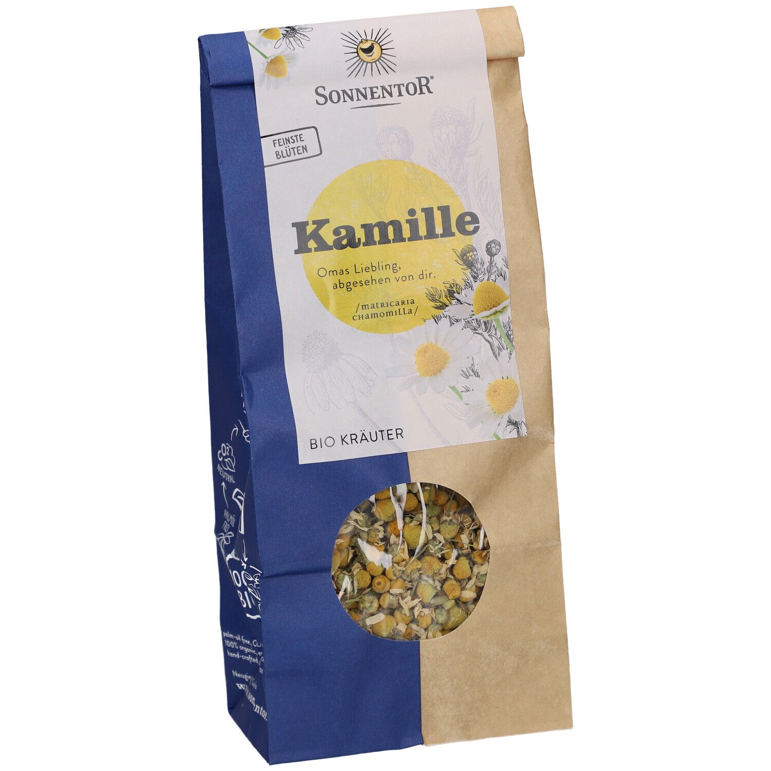 Beutel mit Kamillenblüten. Sichtbar: Markenname Sonnentor, Kamille-Schriftzug, Bio Kräuter. Sichtfenster mit Blüten.