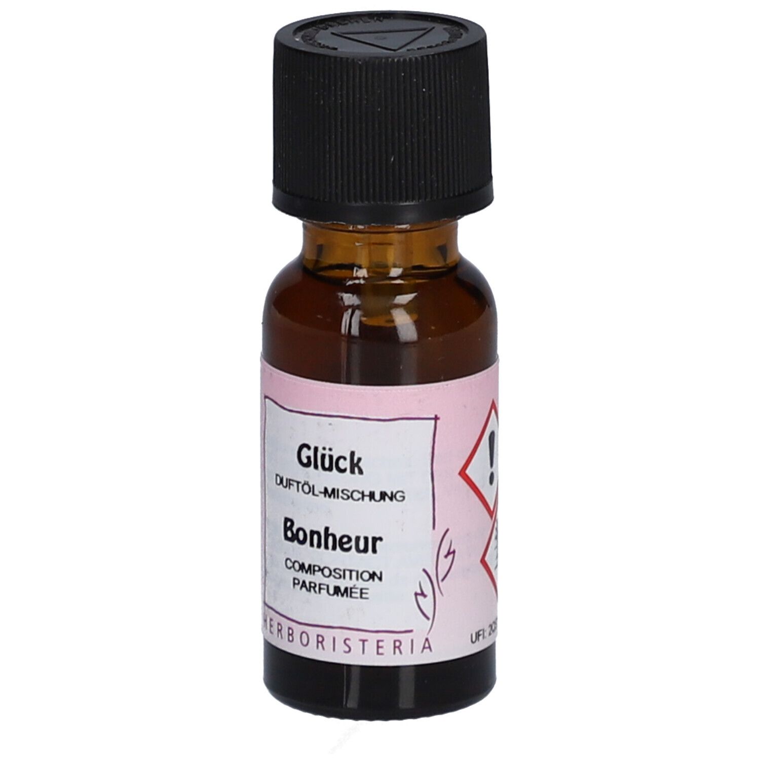 Braune Glasflasche mit schwarzem Deckel. Etikett mit Text und Gefahrensymbolen. Marke: HERBORISTERIA. UFI-Code.