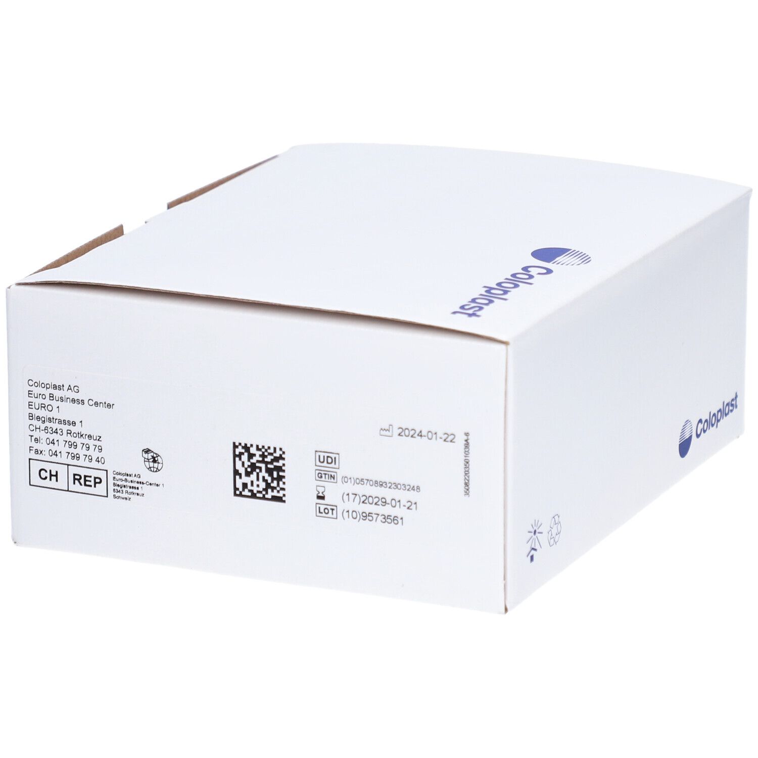 Emballage blanc avec informations. Logo Coloplast. Informations d'adresse et codes.