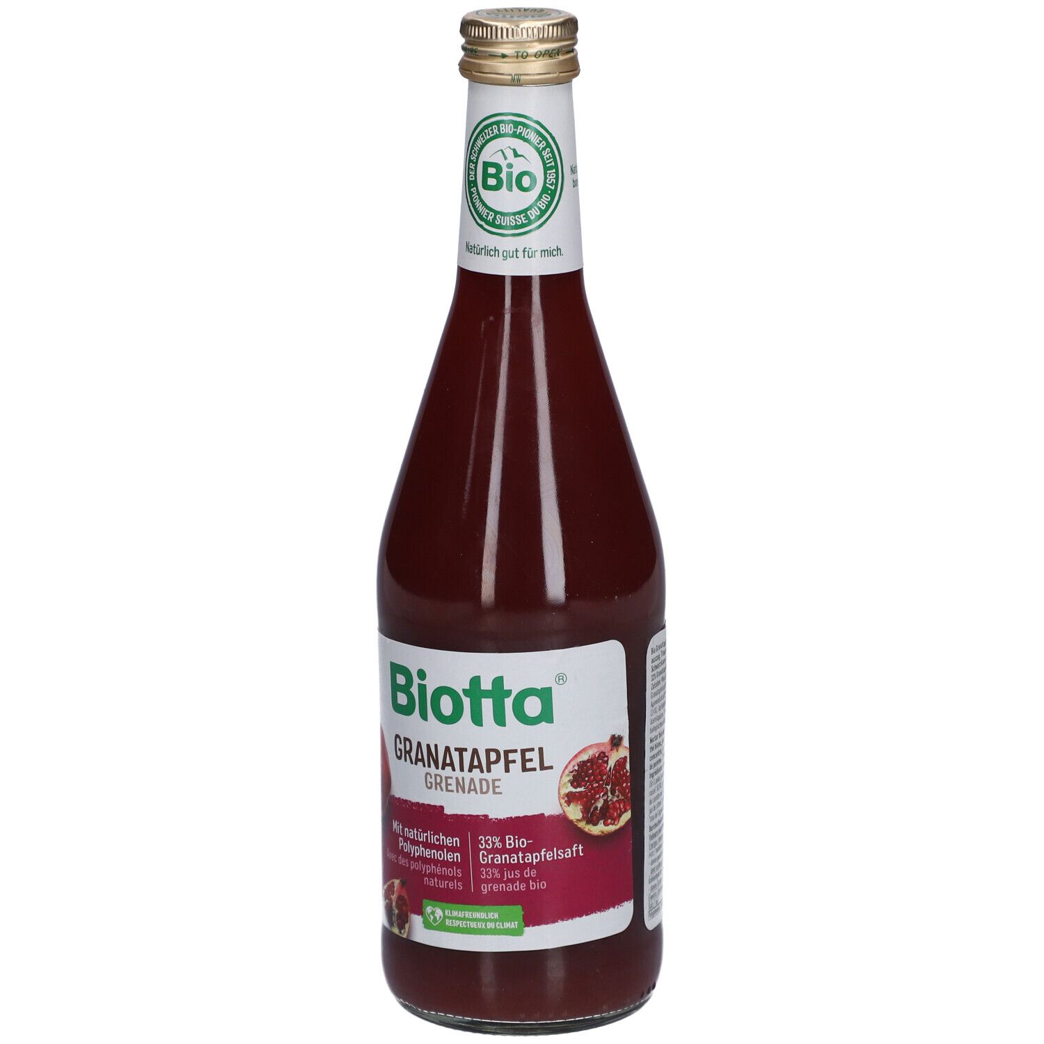 Glasflasche mit rotem Saft. Aufschrift: BIOTTA Granatapfel, Bio-Siegel. Abbildung von Granatapfel.