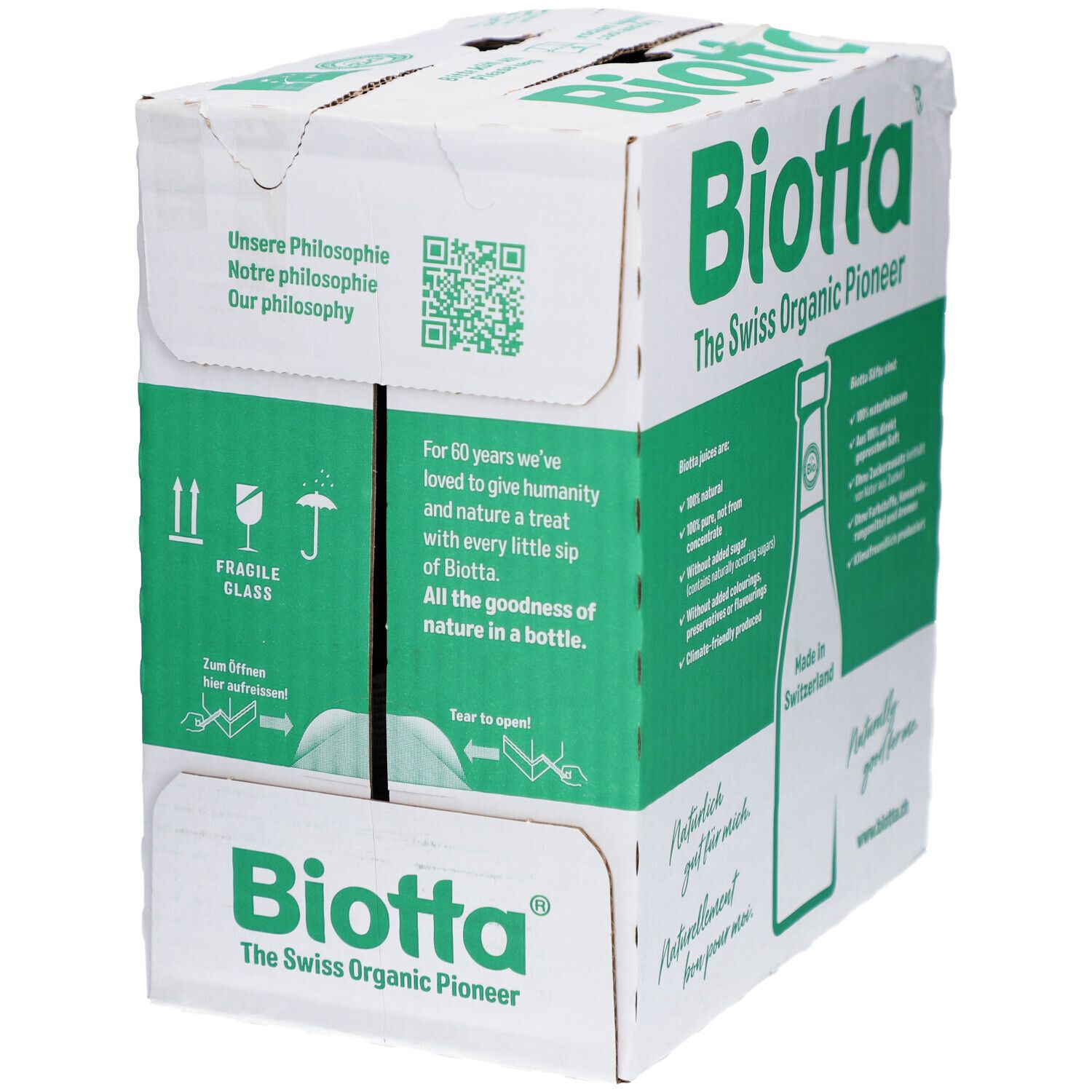 Karton BIOTTA. Text in Englisch: The Swiss Organic Pioneer. Produktinformationen und Logo. Hergestellt in der Schweiz.