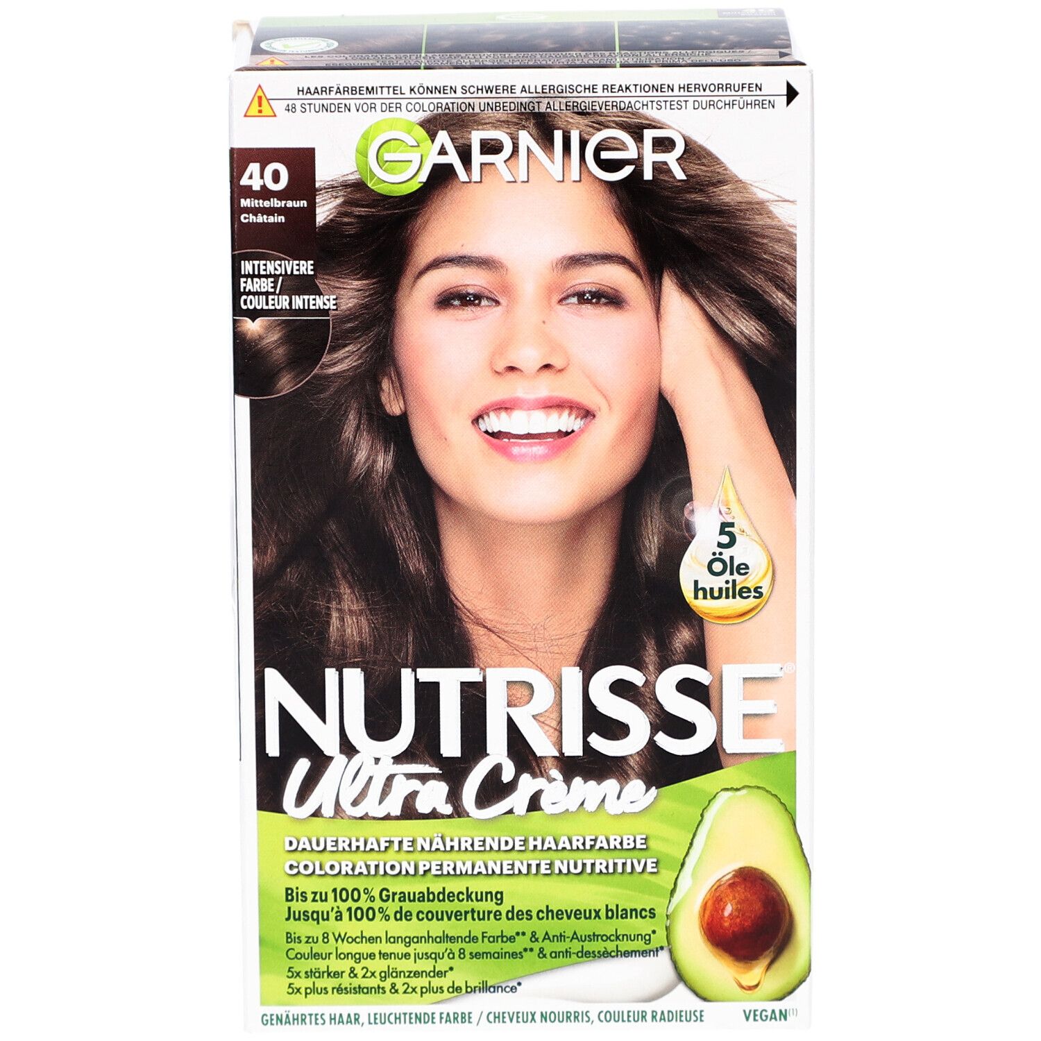 Boîte de coloration capillaire Garnier Nutrisse Ultra Creme. Couleur 40 Brun Châtain. Femme aux cheveux bruns.