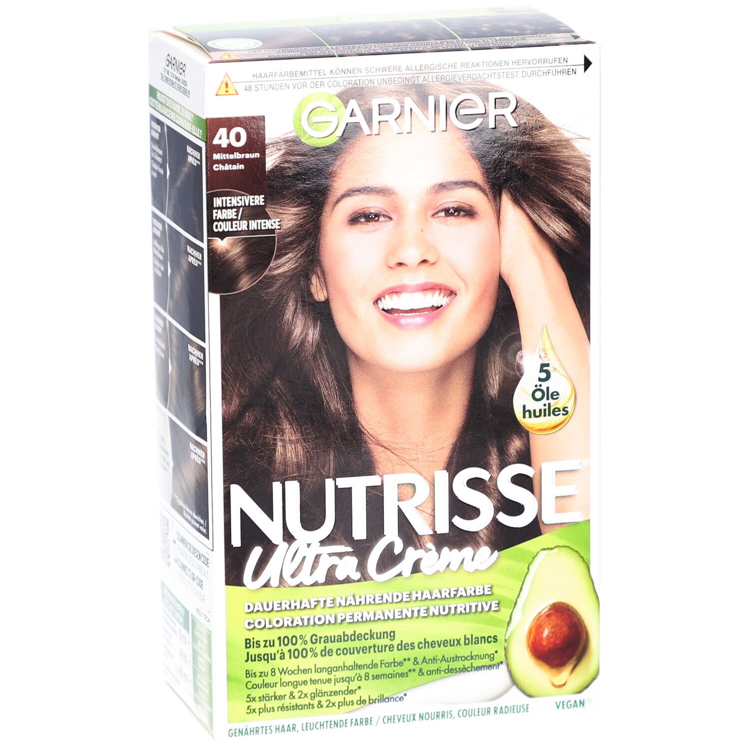 Boîte de coloration capillaire Garnier Nutrisse Ultra Creme. Couleur 40 Brun Châtain. Femme aux cheveux bruns.