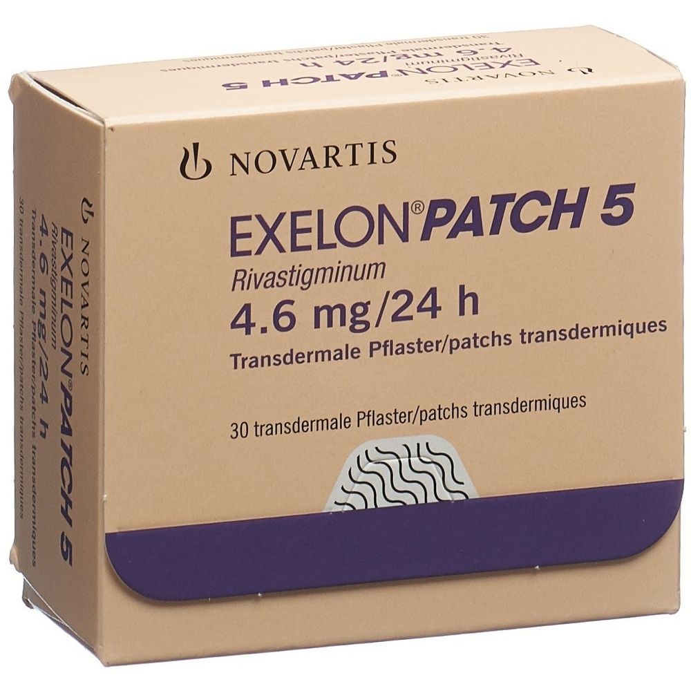 Kartonverpackung. Aufschrift: EXELON Patch 5. 4,6 mg/24 h. Lila und weiße Schrift auf braunem Hintergrund. Eckige Form.