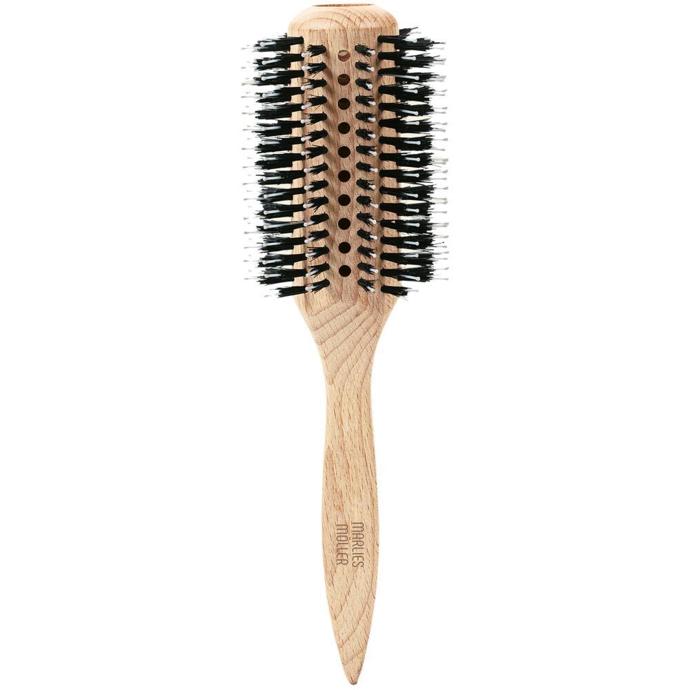 Brosse à cheveux ronde, manche en bois, soies noires. Marque Marlies Möller sur le manche.