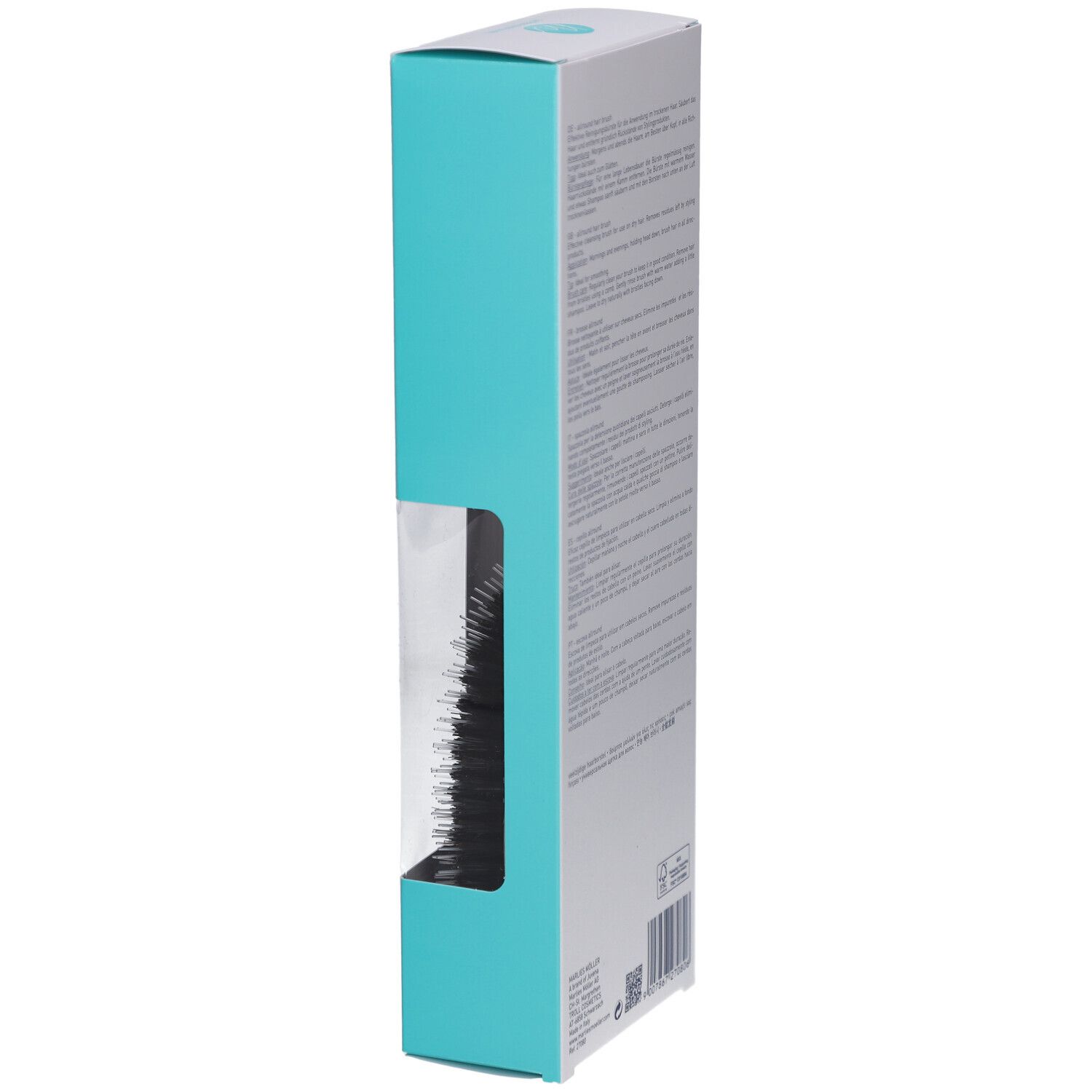 Vue latérale de l'emballage. Boîte blanche avec bande turquoise. Fenêtre transparente montrant la brosse.