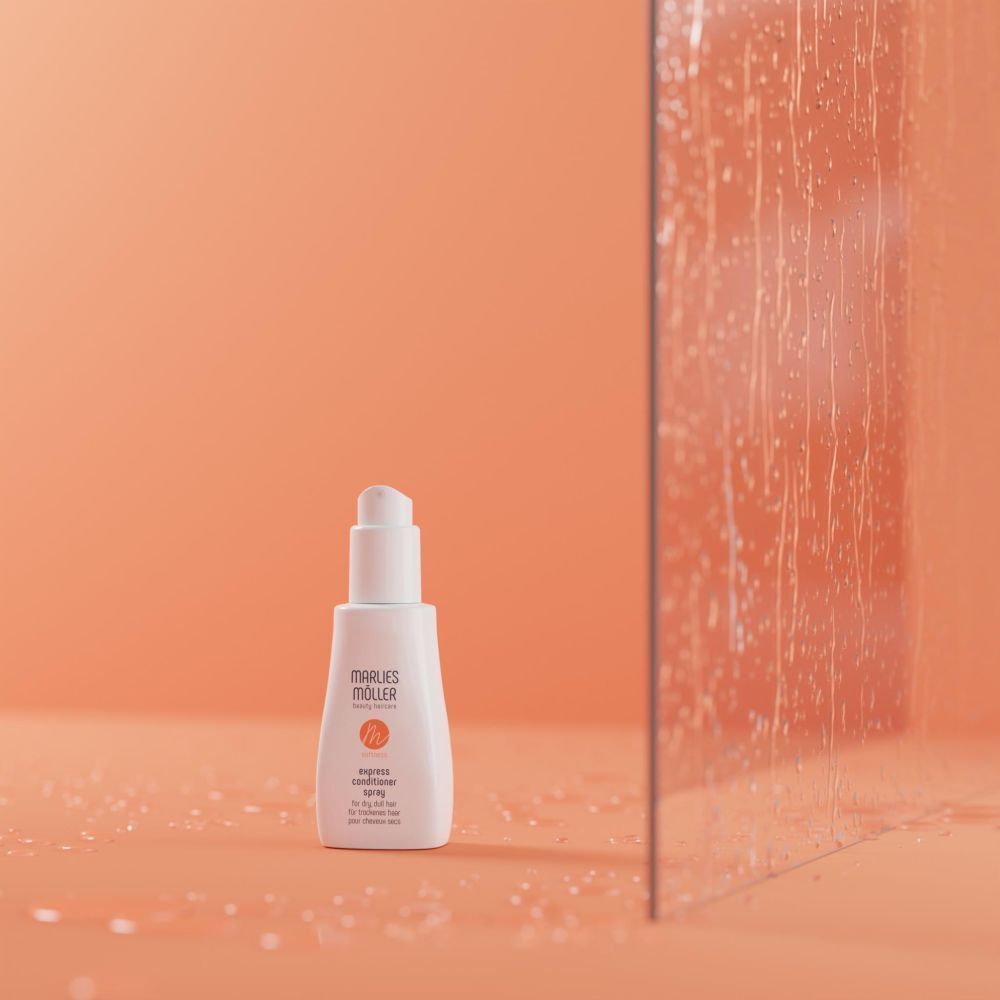 Flacon blanc sur fond orange. Inscription: Marlies Möller, softness, Express Conditioner Spray.