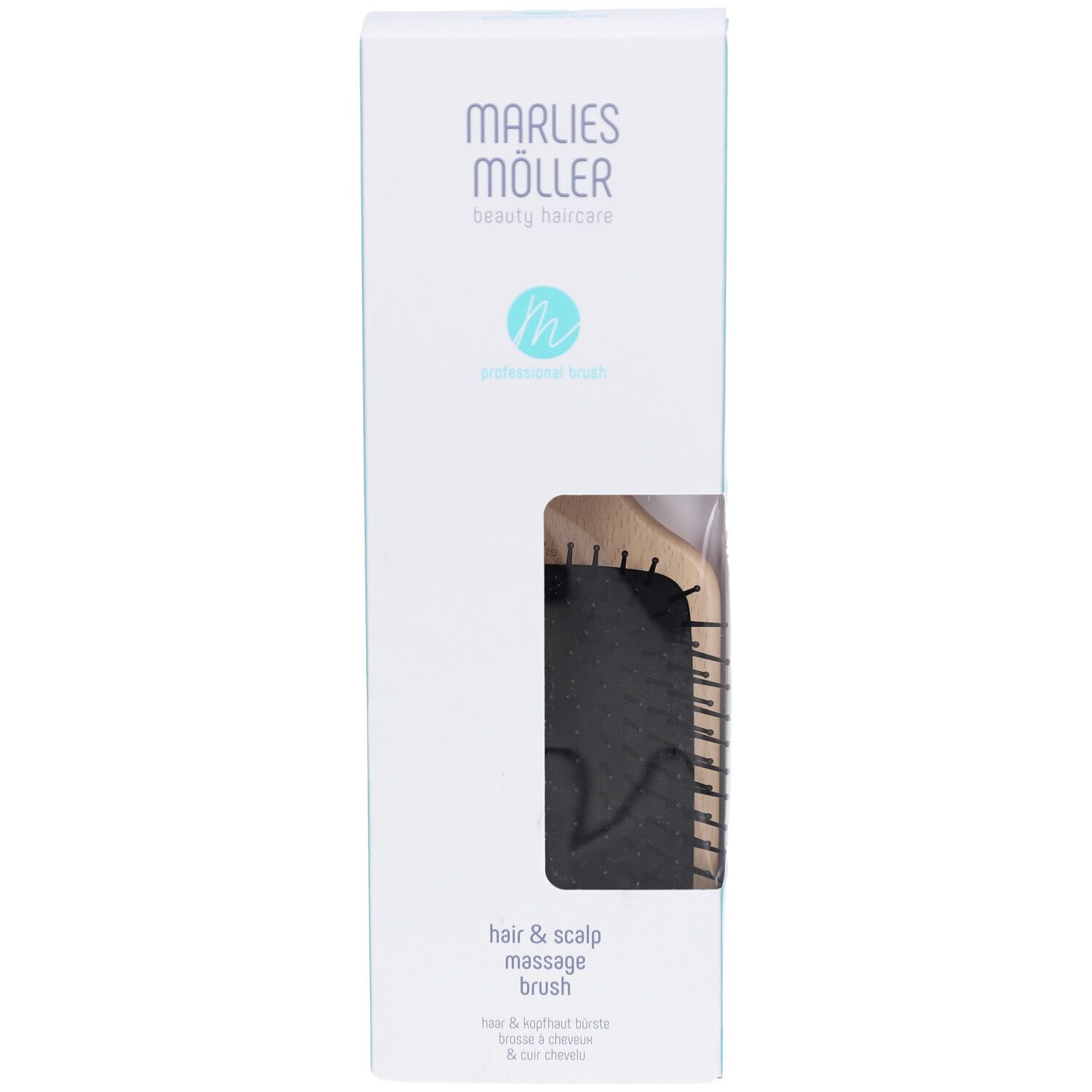 Emballage de brosse de massage. Marlies Möller. Boîte blanche avec fenêtre. Brosse avec manche en bois et poils noirs.