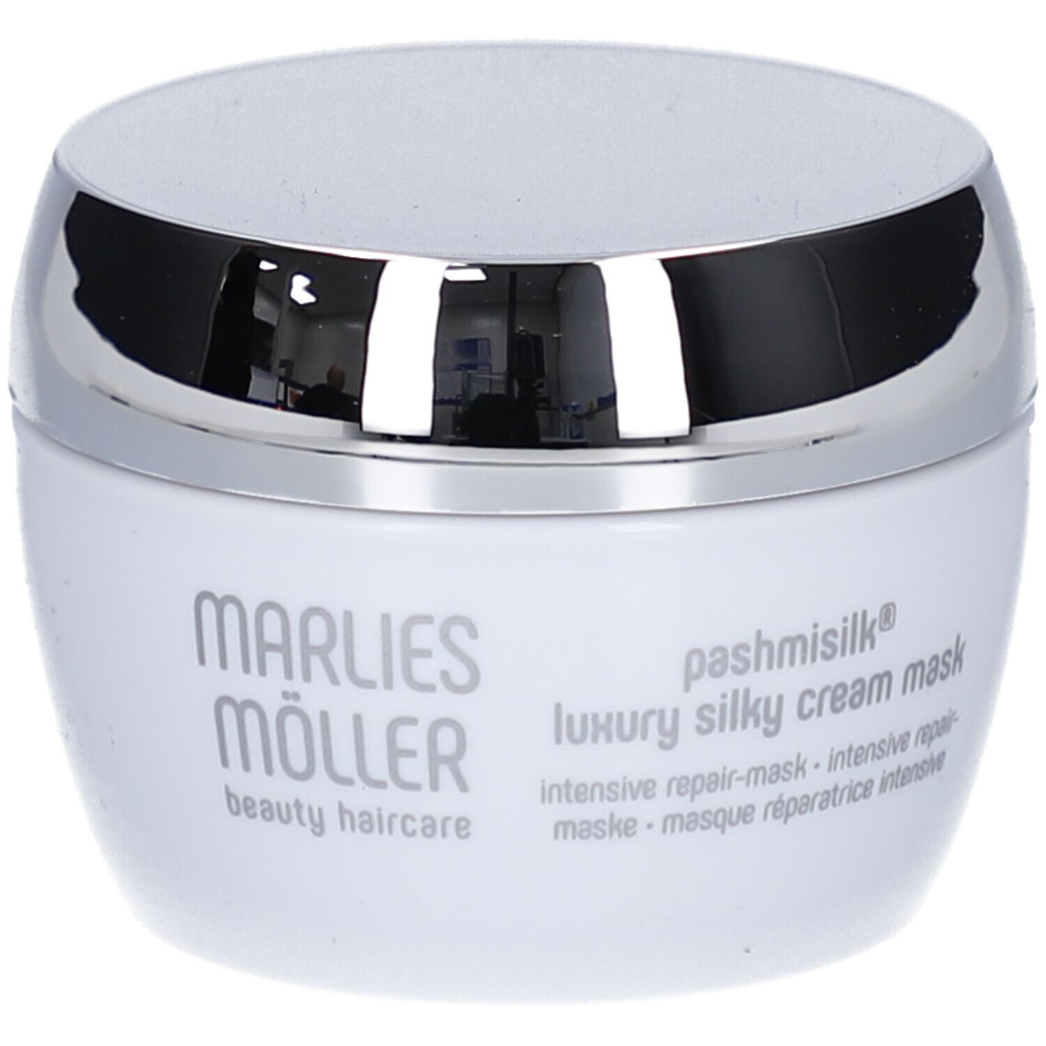 Weißer Tiegel mit silbernem Deckel. Aufschrift: Marlies Möller, Pashmisilk, Luxury Silky Cream Mask.