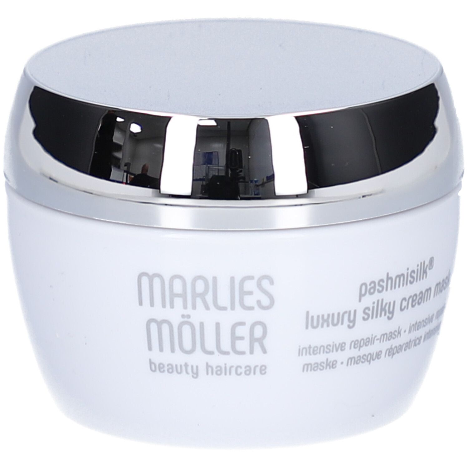 Weißer Tiegel mit silbernem Deckel. Aufschrift: Marlies Möller, Pashmisilk, Luxury Silky Cream Mask.