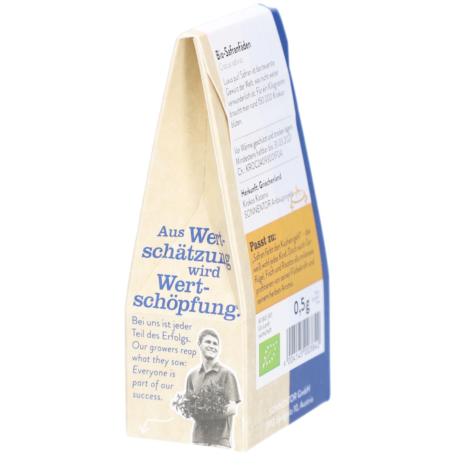 Sonnentor Safranfäden Verpackung, Seitenansicht. Text über Wertschöpfung. Bio-Siegel. 0,5g Inhalt.
