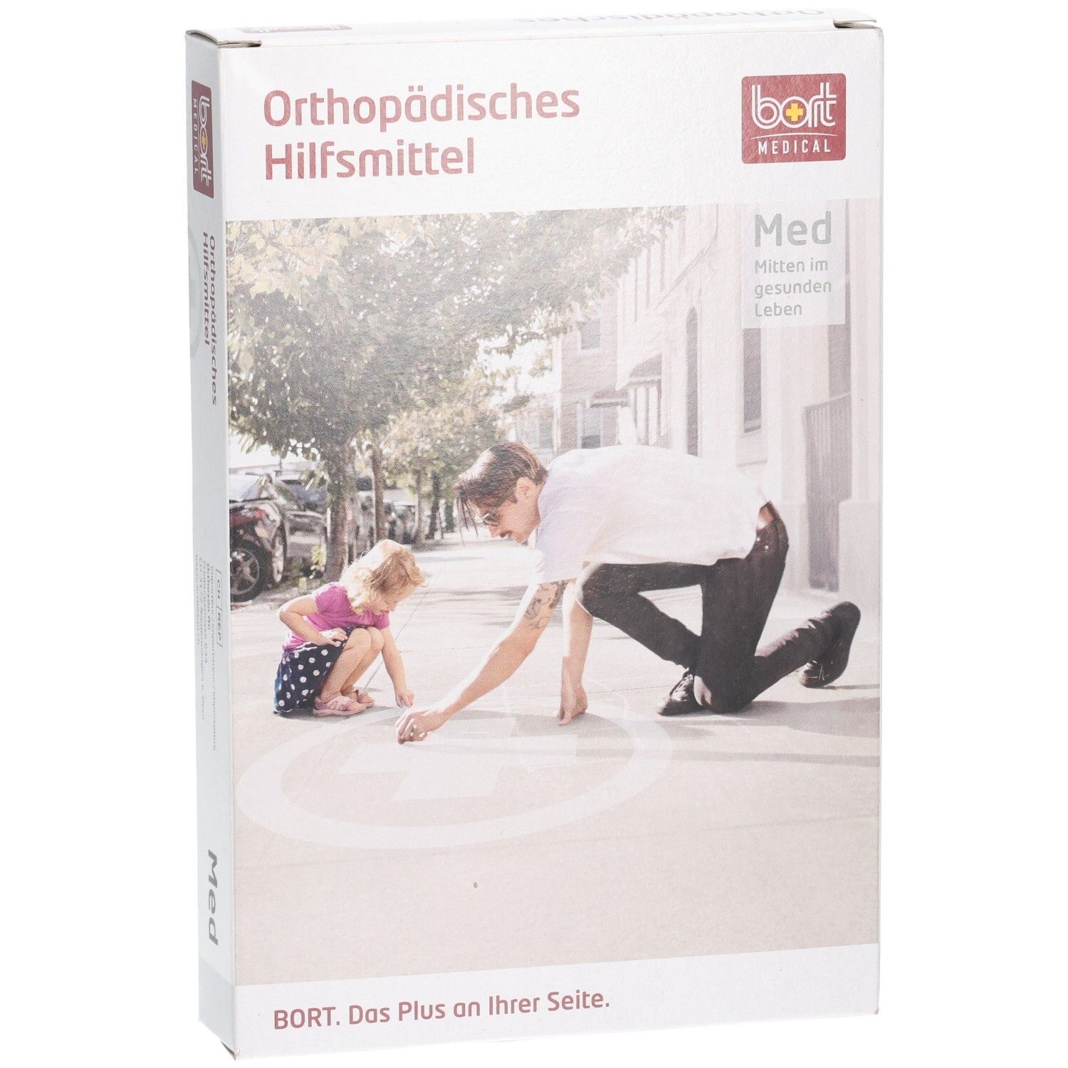 Produktverpackung. Aufdruck: Orthopädisches Hilfsmittel, BORT MEDICAL, Med. Abbildung: Mann und Kind malen auf dem Boden.